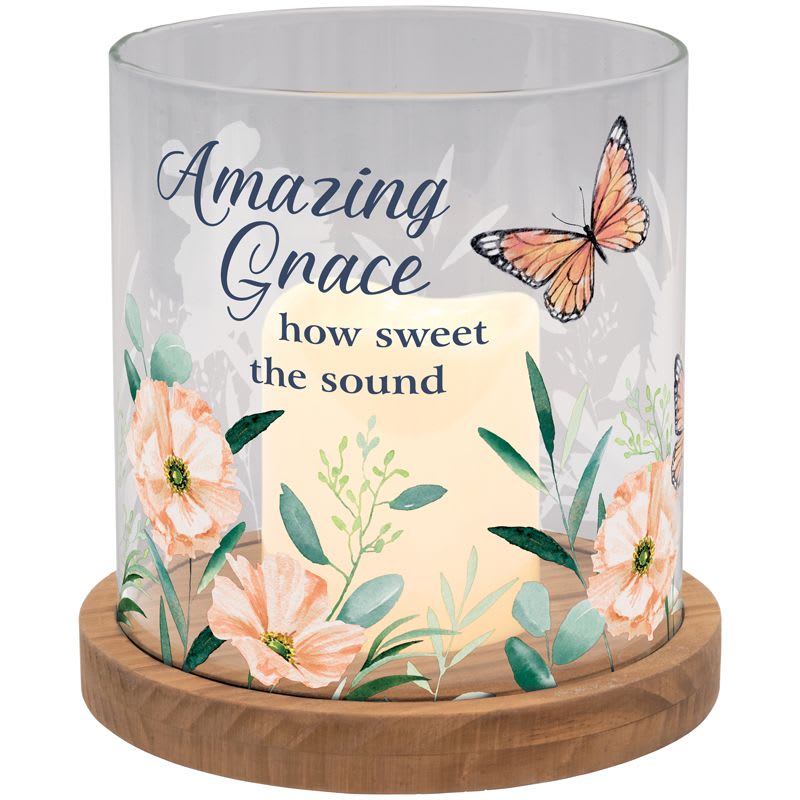 “Amazing Grace” Hurricane Candle - This 7" tall hurricane candle are a glass wood composite and have a flickering LED flame.