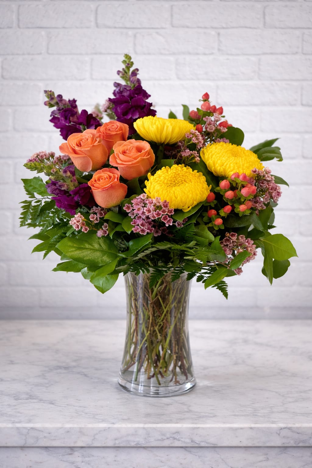 New Horizon  -  Bouquet will be delivered approximately as pictured. To ensure the freshest and most beautiful arrangement, substitutions of flowers, greenery, or the vessel may be made. Any substitutions will preserve the style and color palate. 
