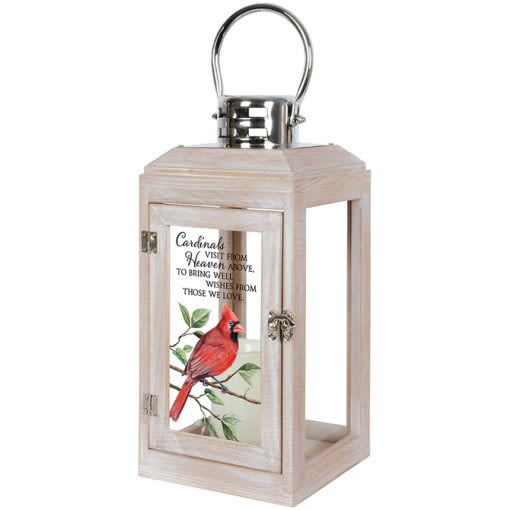 Wooden lantern with a cardinal illustration and memorial text