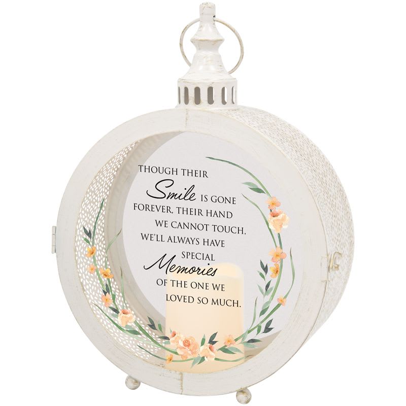 White memorial lantern with floral wreath and printed sympathy message
