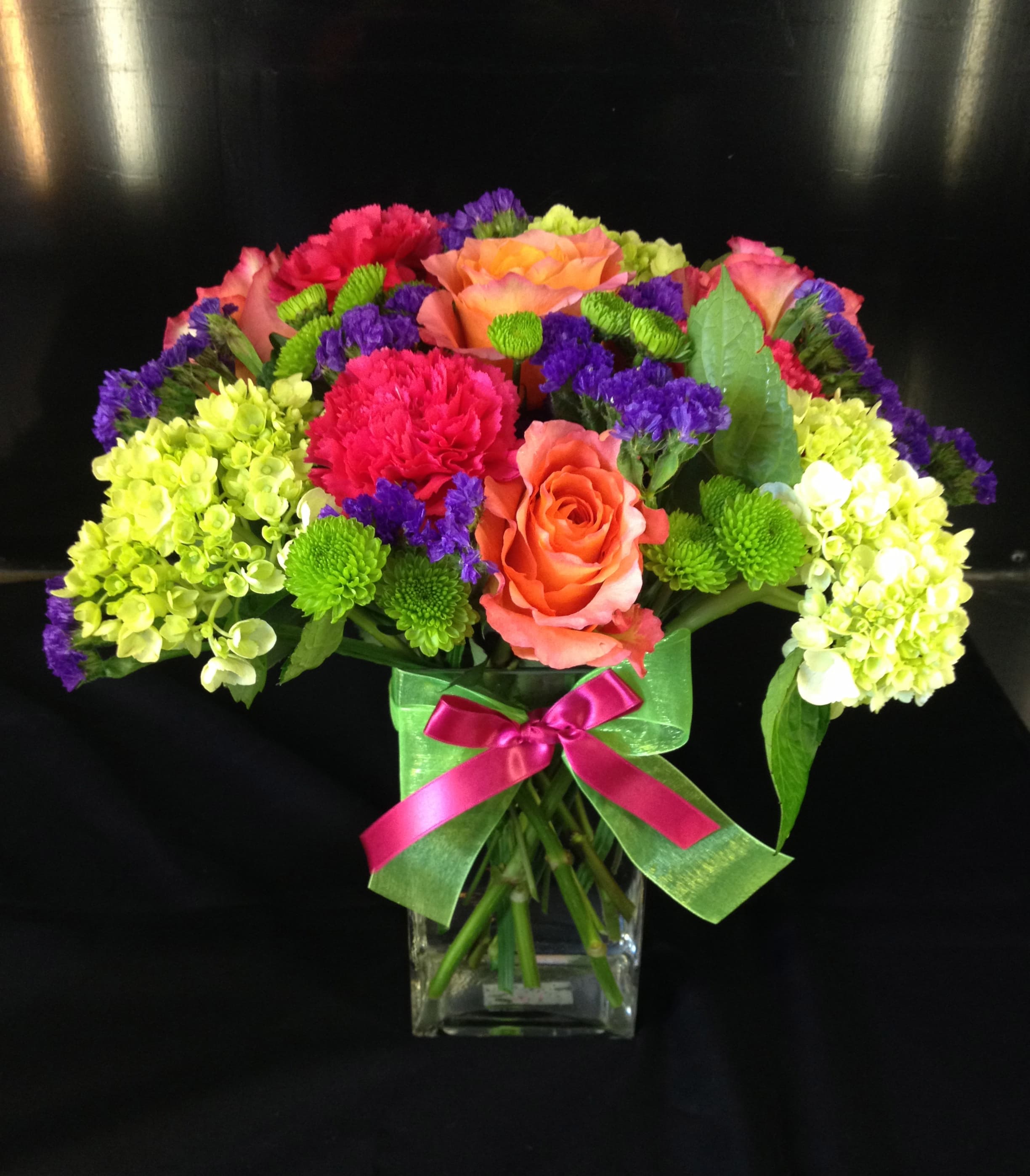 The Dauphine Street - 13 inches tall. Mix of hydrangea, "Free Spirit" roses, dianthus, Yoko Ono's and Status