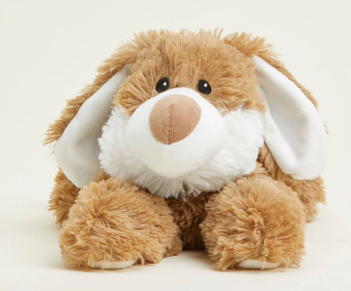 Plush brown-and-white dog toy with floppy ears