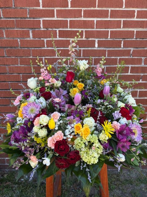 Garden of Memories - An urn ring made of a variety of flowers with a spring garden look.