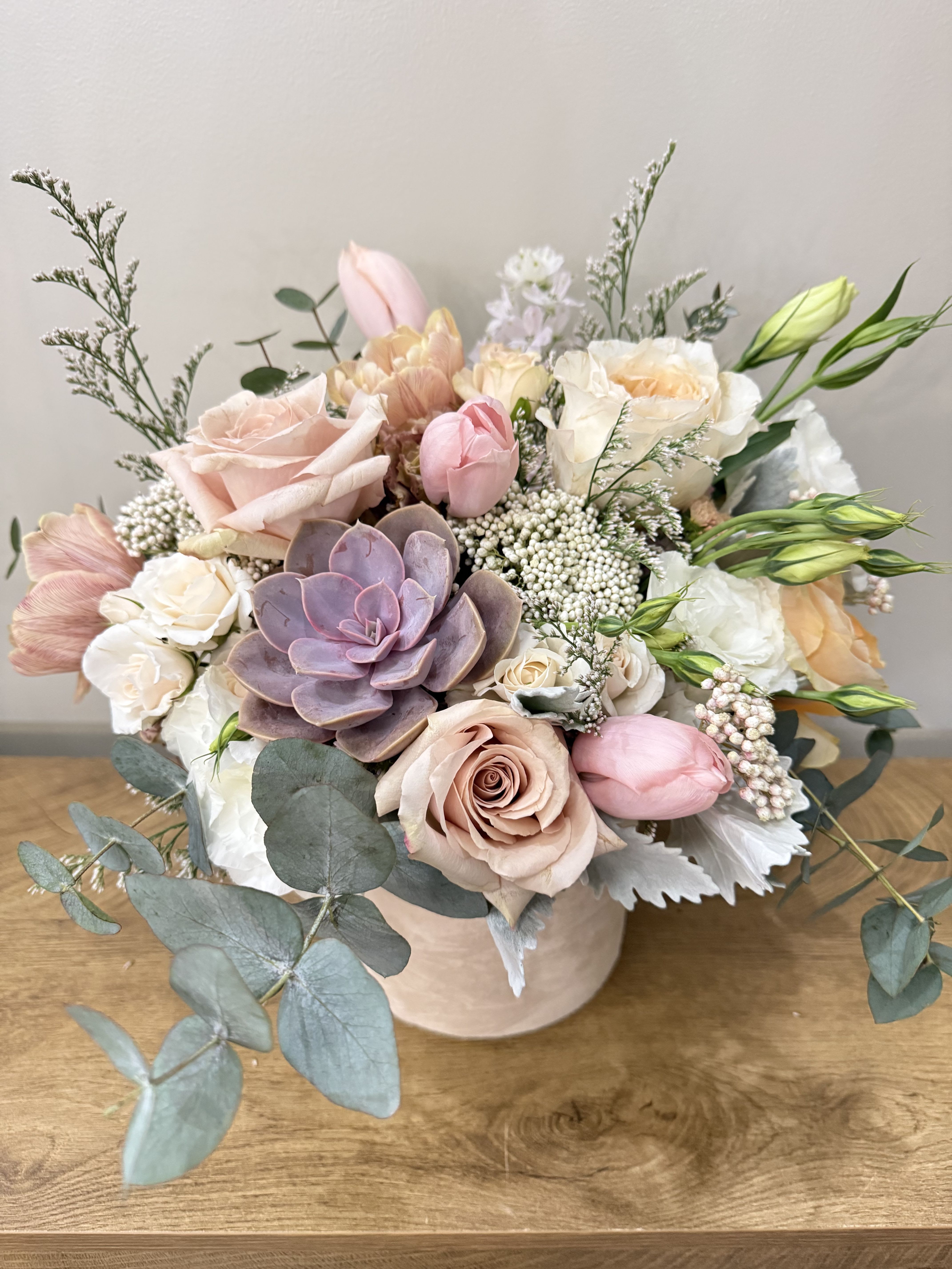 Mother Earth - Natural tones flowers and succulent  in a velvet vase making the best gift for Mother’s Day!