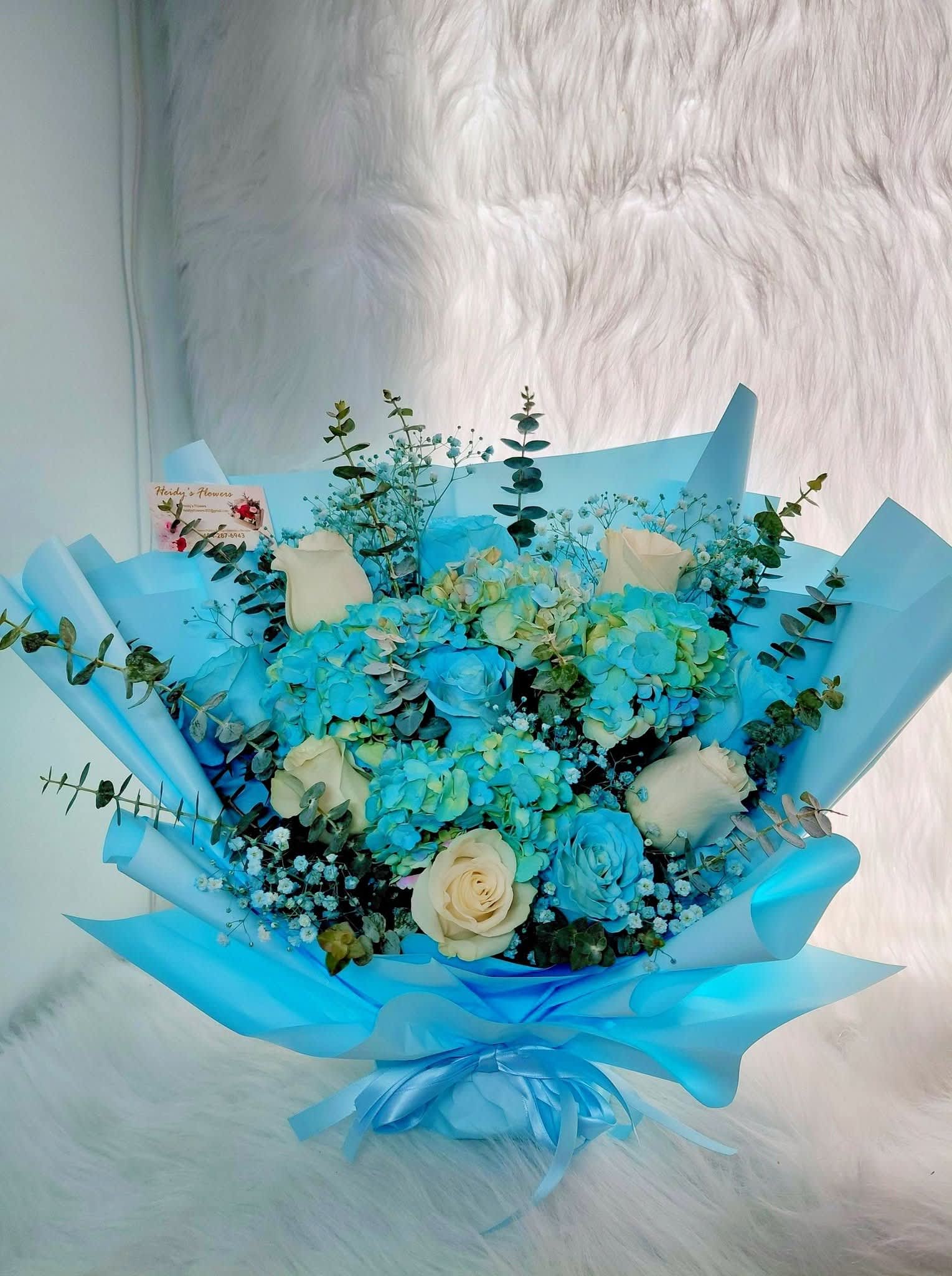 Nlue bouquet - A bouquet in shades of blue—perfect for gifting to a guy or a girl who loves blue flowers—an elegant bouquet.