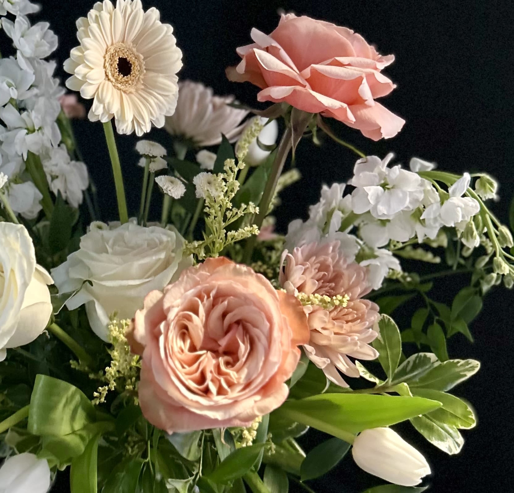 Peaches &amp; Cream Wrapped Arrangement - Sophisticated peachy pinks, soft corals, muted apricot and creamy neutrals are among the spring blooms chosen for this showstopper. 