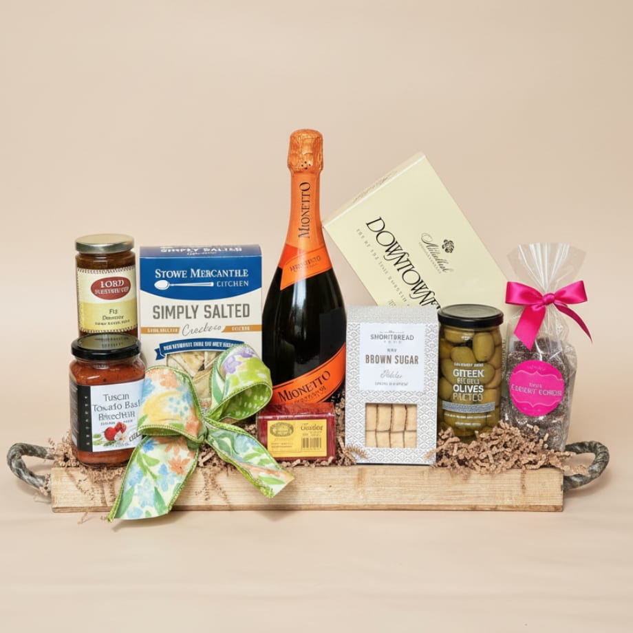 A Toast to Mom Basket - GOURMET BASKET COLLECTION | LOCAL DELIVERY ONLY  A cheerful, ready-to-gift basket featuring bubbly Prosecco and a curated selection of sweet + savory treats. Made for celebrating Mom and all that she does because she deserves a toast of her own!  Please note: Recipient must be 21 years or older and present a valid ID at time of delivery.