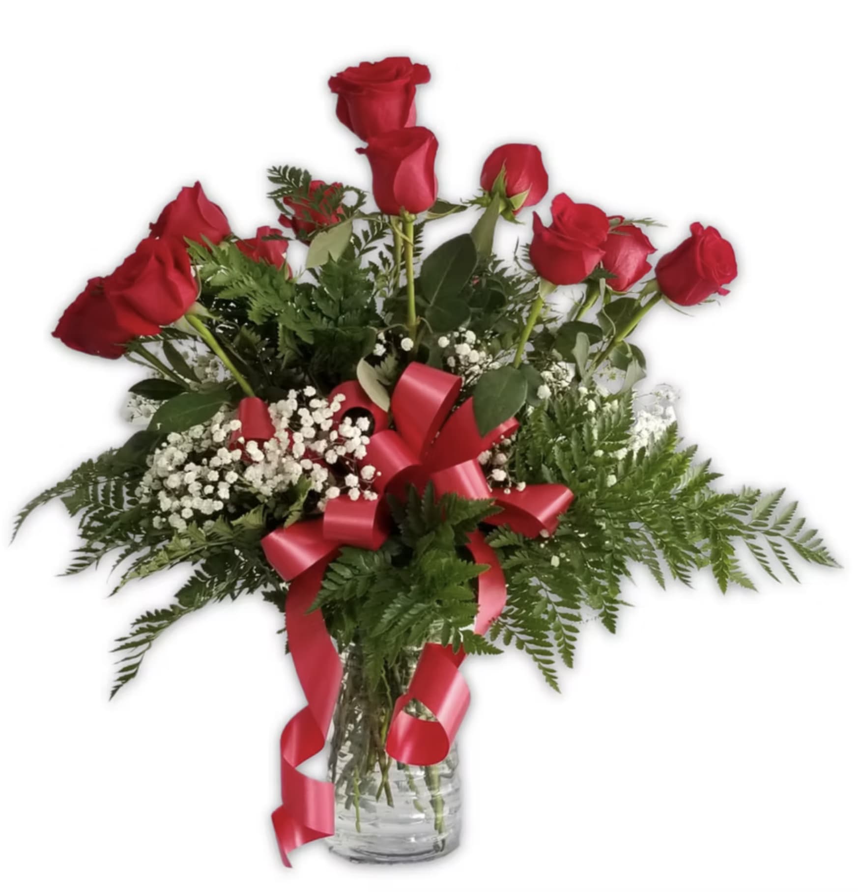 Red roses in a glass vase with baby's breath and a red ribbon