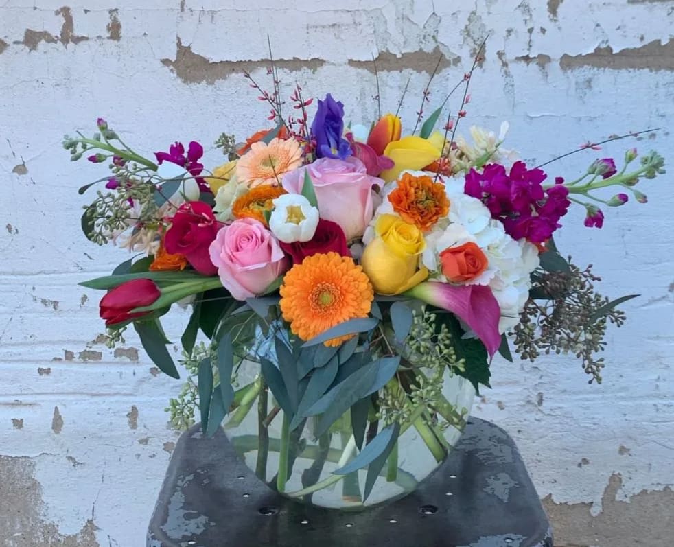 Colorful mixed bouquet in a clear glass vase