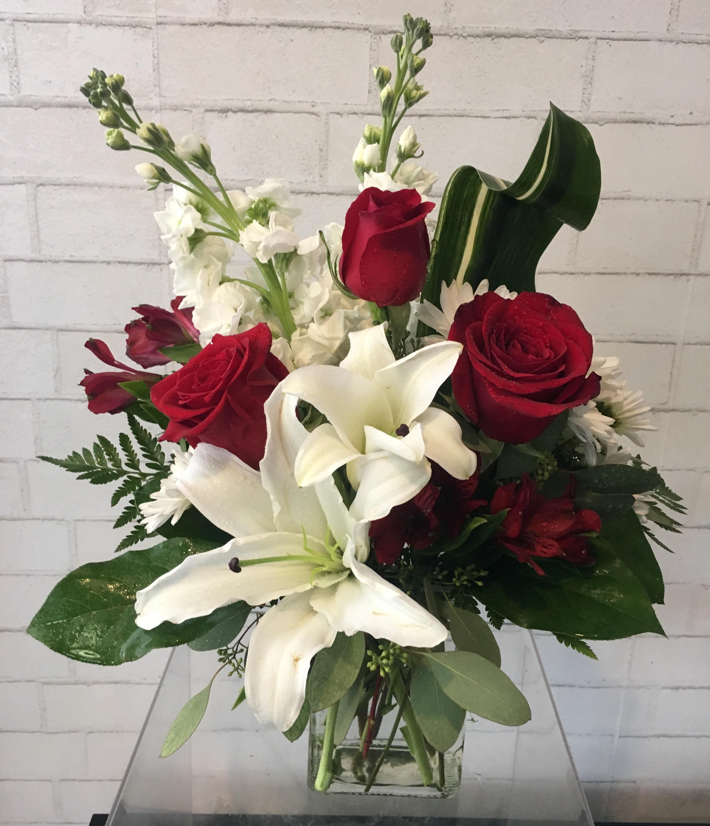 Lil' Red!! - Show your game day spirit with this red and white floral arrangement! 