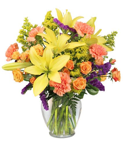 Bursting With Glee! Arrangement - Containing your excitement just isn't possible with this vase of flowers bursting with glee in your midst. Bright yellow lilies make a statement against an assortment of orange spray roses and carnations and purple statice inside of a ginger vase. This show-stopping flower arrangement of lilies and roses is a fall delight to display on that special someone's table.  Includes: Ginger Vase Foliage: Leather Leaf, Variegated Pittosporum , Orange Miniature Spray Roses , Yellow Lilies , Orange Carnations , Purple Statice , Solidago.