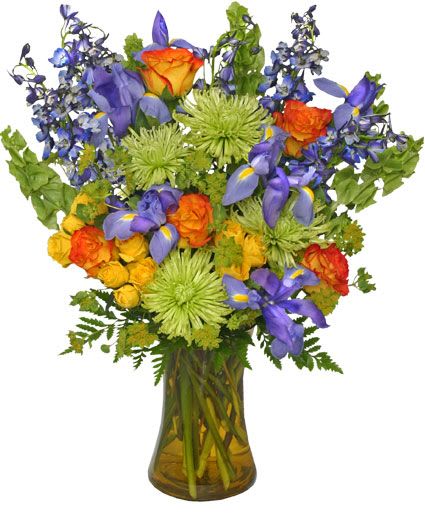 Floral Stunner Bouquet of Flowers - Lift their spirits and shake off the blues with a dose of floral Wintspiration! Say "Thank You," "I'm Sorry" or "Thinking of You" with this Floral Stunner Bouquet! Order flowers online 24/7 or call and place a direct order if you prefer.  Includes: Yellow Gathering Vase, Foliage: Leather Leaf, Bupleurum, Blue Iris, Yellow Spray Roses, Lime Green Fuji Spider Mums, Bells Of Ireland, Blue Delphinium, Bicolored Orange Circus Roses.