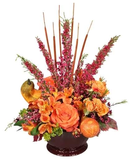 HOMECOMING HARVEST Arrangement - 'Tis the season of reaping good food and memories with this bounty of autumn-themed flowers! Big, bold orange roses are accompanied by orange miniature roses, alstroemeria, and pink heather with fall leaves, dried cattails and mini gourds delicately arranged in a burgundy bowl. Let this festive flower arrangement delight and dazzle as you create lasting memories of fall and homecoming, surrounded with the ones you love best.  Includes: Plastic Burgundy Design Bowl , Foliage: Leather Leaf, Orange Roses, Orange Mini Spray Roses, Orange Alstroemeria, Pink Heather, Green Bupleurum, Preserved Fall Leaves, Dried Miniature Cattails, Miniature Gourds, Fall Berry Clusters.
