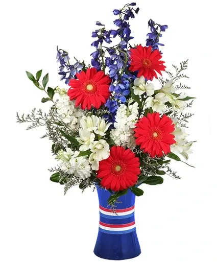 Red, White &amp; Beautiful Bouquet of Flowers - Center your picnic table this Memorial Day or 4th of July with dazzling patriotic beauty with the Red, White, &amp; Beautiful vased arrangement. This arrangement is perfect for a centerpiece, or just to spread some patriotism this summer. Vibrant red gerbera daisies stand out against white alstromeria and shooting blue delphinium embodying the spirit of a true American patriot.  Includes: Blue Gathering Vase , Foliage: Myrtle , Red Gerberas , White Avalanche Alstroemeria , Blue Delphinium , White Stock , Misty Blue Limonium , Red, White &amp; Blue Ribbon.