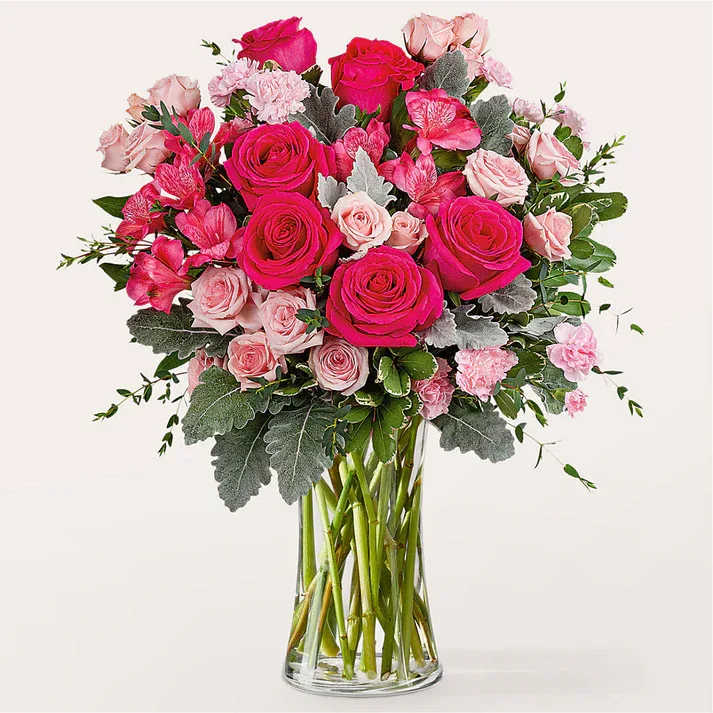 Tickled Pink Bouquet - Bring a smile to their face with the Tickled Pink Bouquet, a delightful mix of varying shades of pink roses, carnations, and alstroemeria.  - Designed by florists, ready to display. For long–lasting blooms, replace the water daily. We suggest trimming the stems every couple days. - Pet Safety Precautions: This bouquet or plant may include flowers and foliage that are known to be toxic to pets. To keep them safe, be sure to keep this arrangement out of your pet's reach.