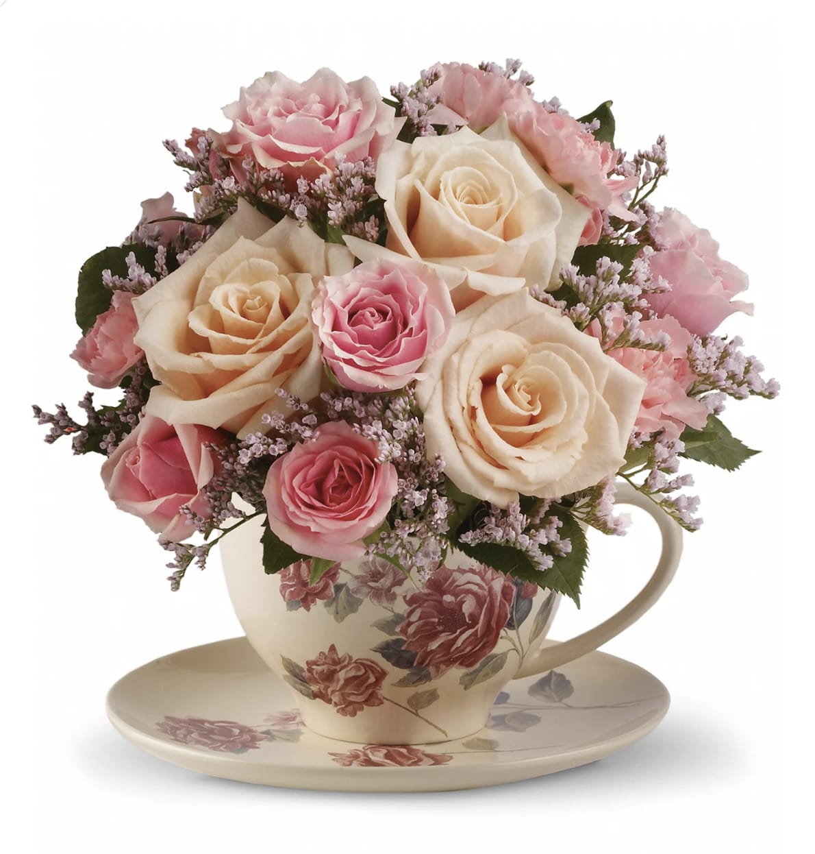 Victorian Teacup Bouquet - Send warm wishes with this lovely gift bouquet that arrives in a ceramic teacup. This charming, old-fashioned bouquet will vary from photo.. different flowers and different design on the cup/. but the overall look and feel is represented in the photo.  Containers are subject to availability and will vary with each piece. 