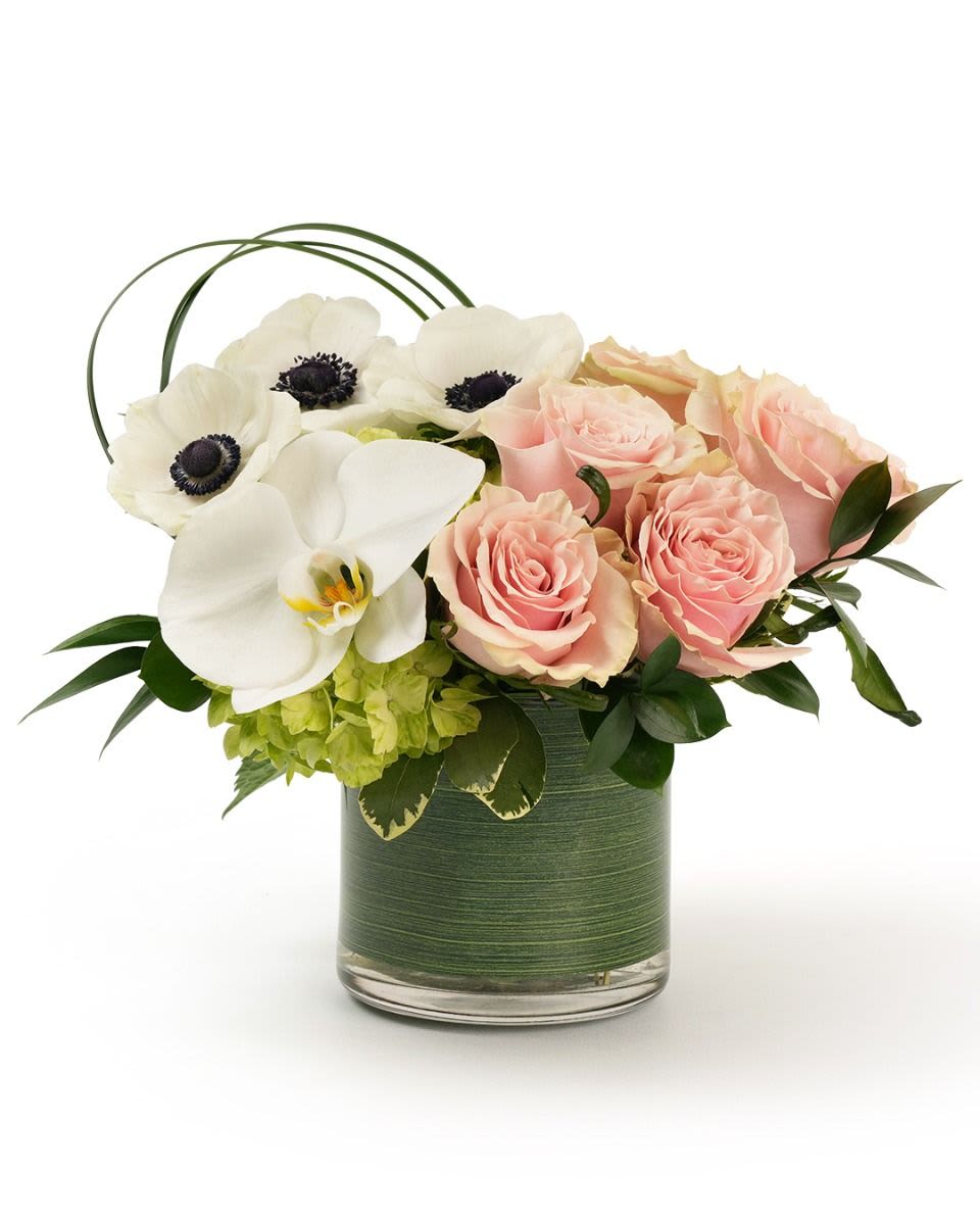 Whispered Love - Soft pink blooms with fresh greenery designed in a delicate love filled garden style.