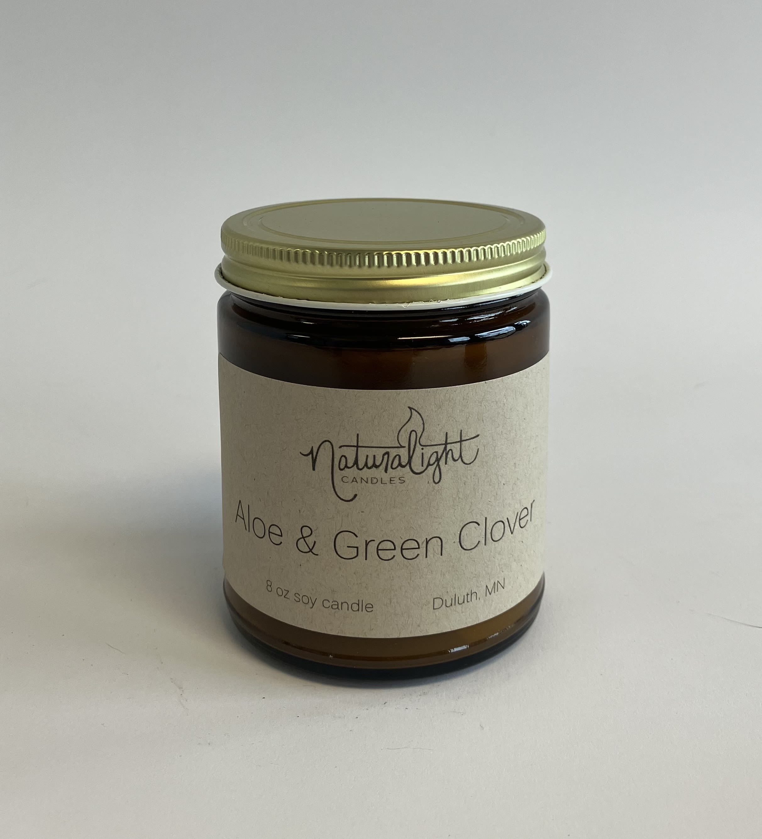 Natural Lights Candles Aloe &amp; Green Clover - Locally made in Duluth and available in a 14oz jar.