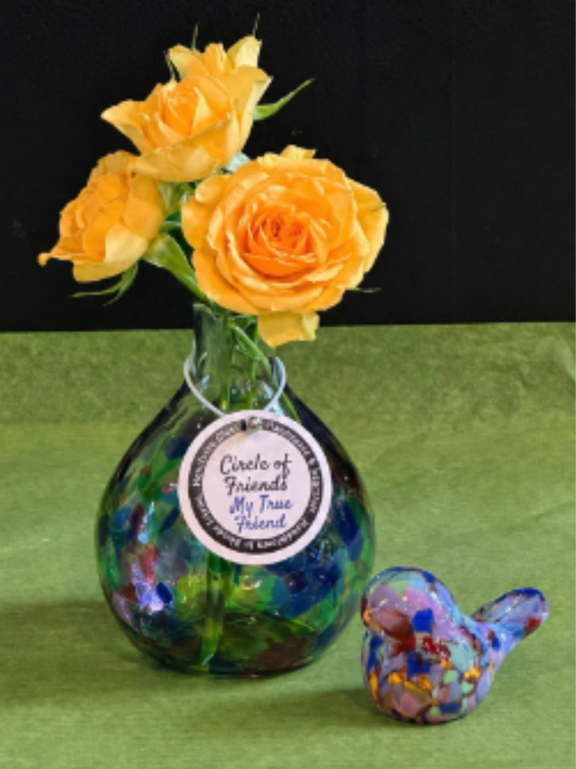 Friendship Vase and Bird set - Celebrate meaningful connections with this charming friendship gift set. Featuring a vibrant hand-blown glass vase, rainbow hand blown glass bird, and fresh floral accents, this piece is a beautiful reminder of the joy and warmth true friends brings.