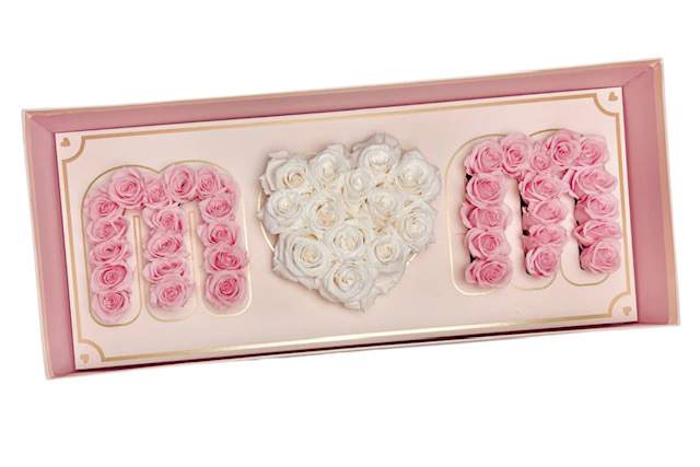Pink and white roses arranged in a framed heart design with the word MOM.