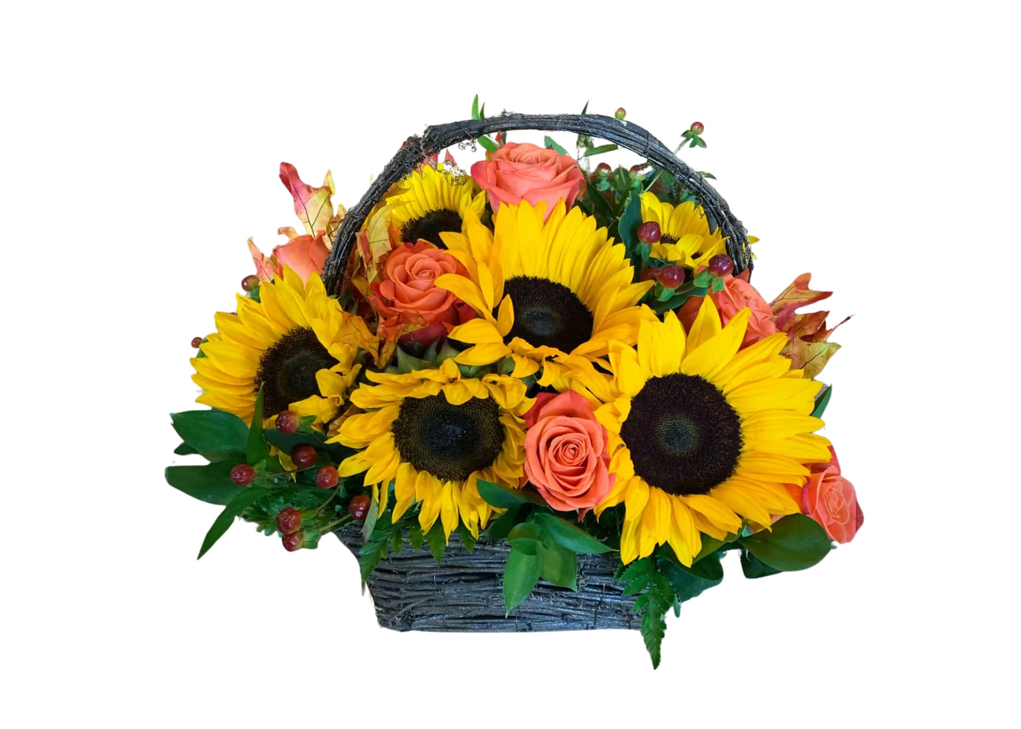 Basket arrangement of sunflowers and coral roses