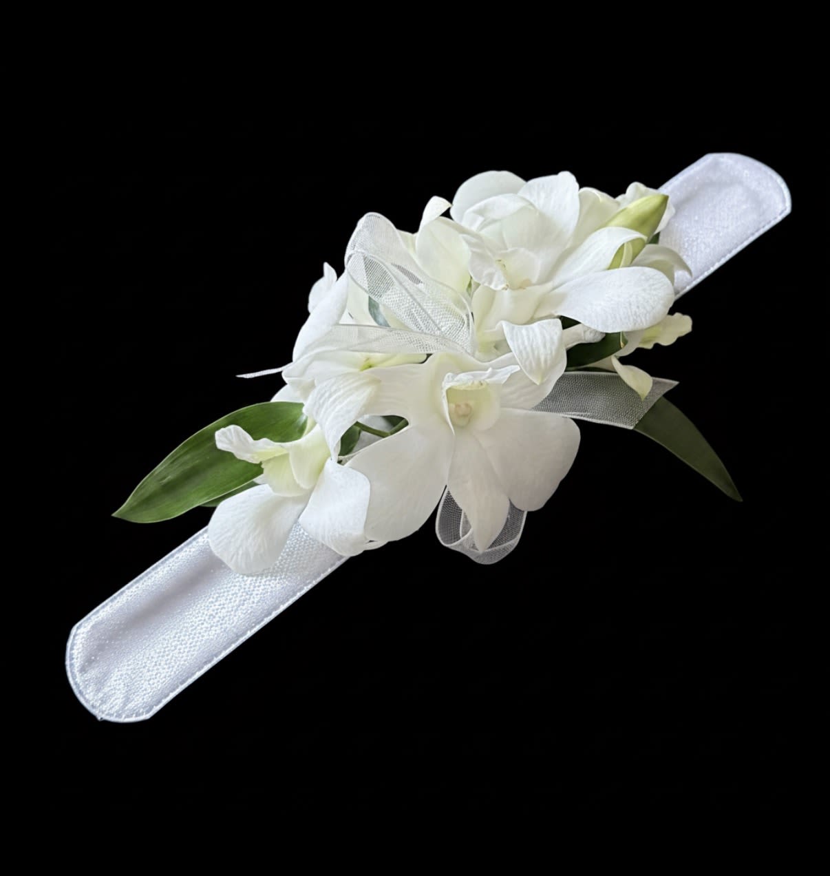 Corsage with dendrobium orchids  - White dendrobium orchid corsage on snap on bracelet