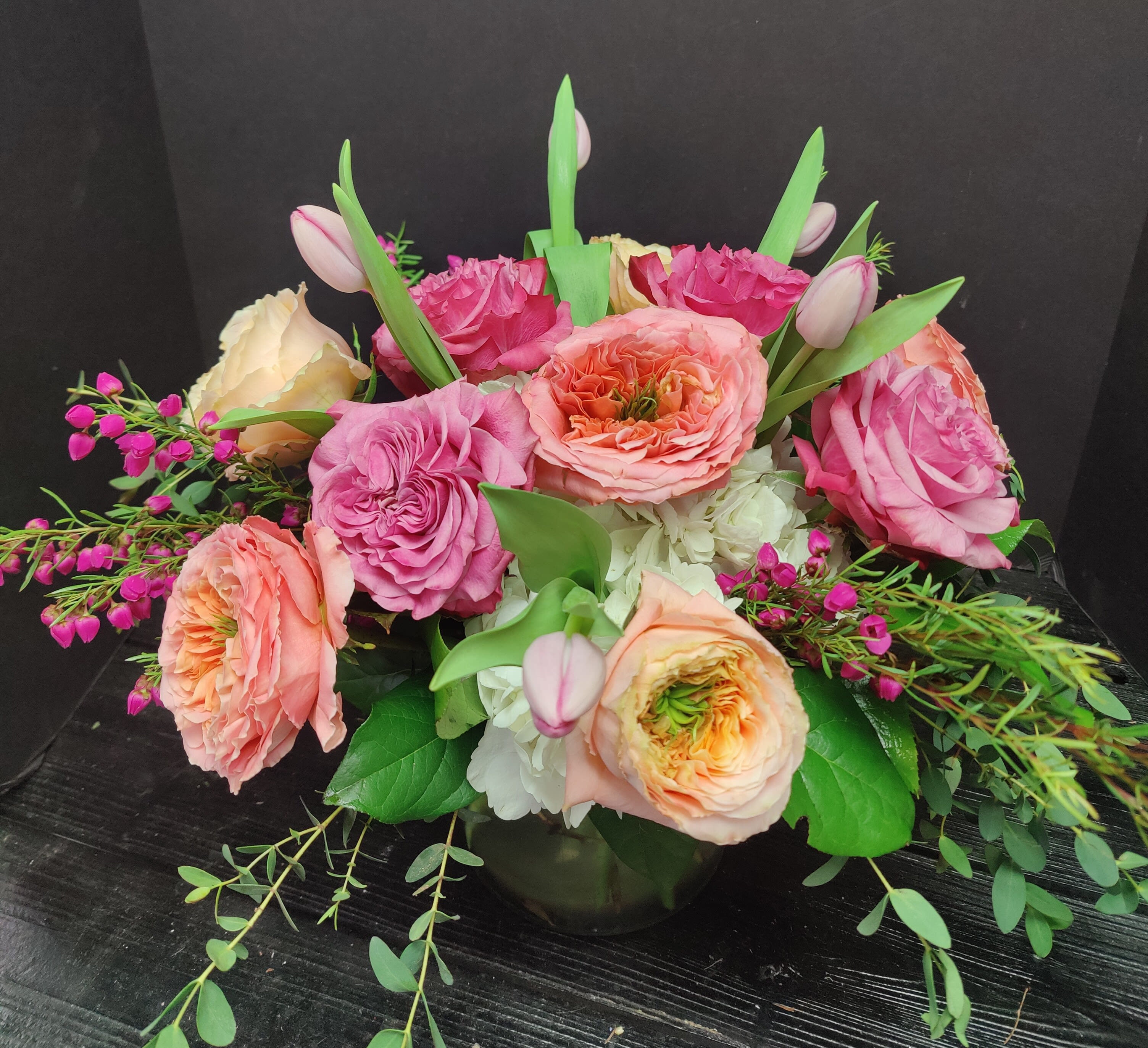 Mom Extraordinaire - A beautiful collection of our Penny roses along with tulips and fragrant filler flowers!