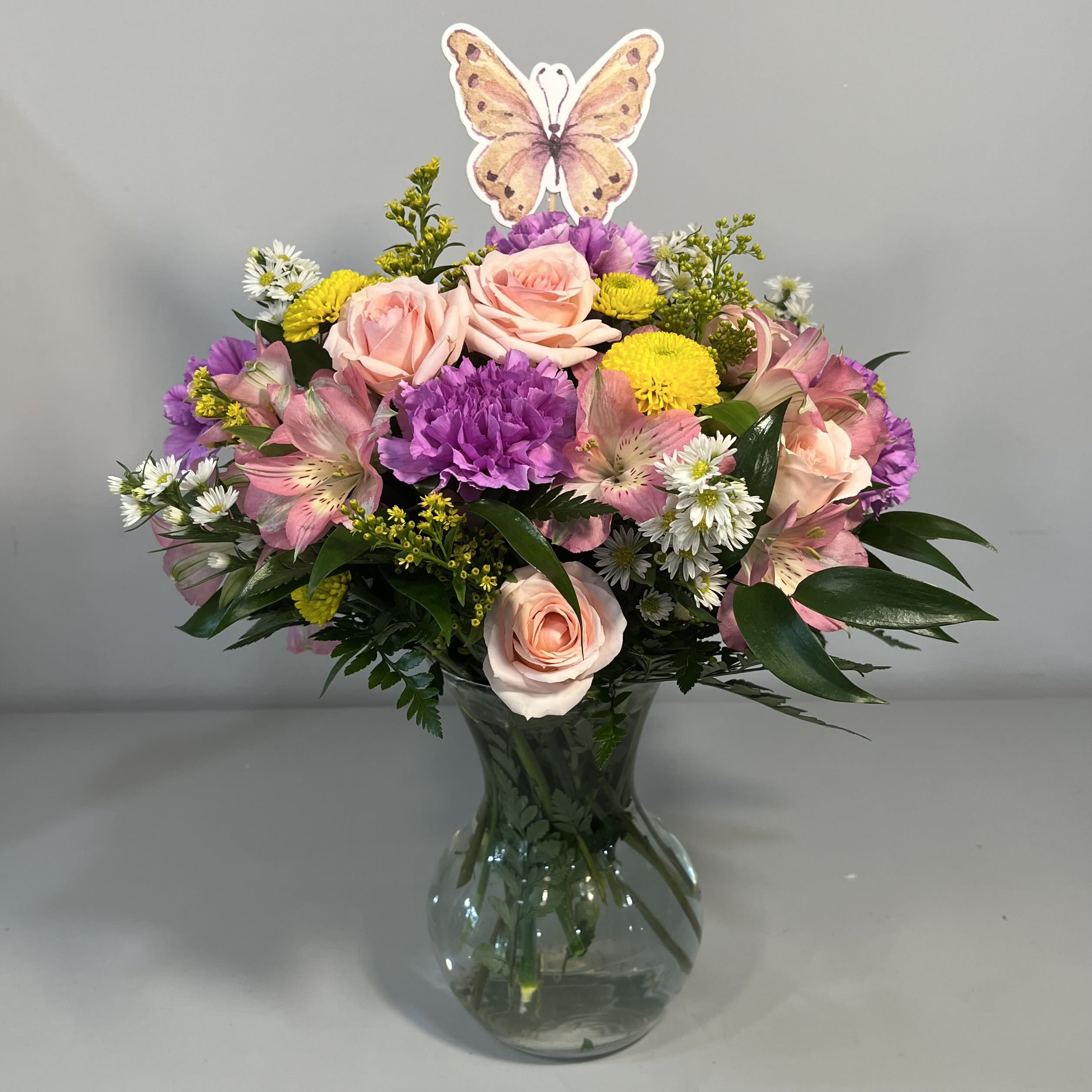 Butterfly Buds - Vase arrangement with Alstroemeria Lilies, Sweet Heart Spray Roses, Carnations and mixed filler flowers (flowers may be substituted due to availability)