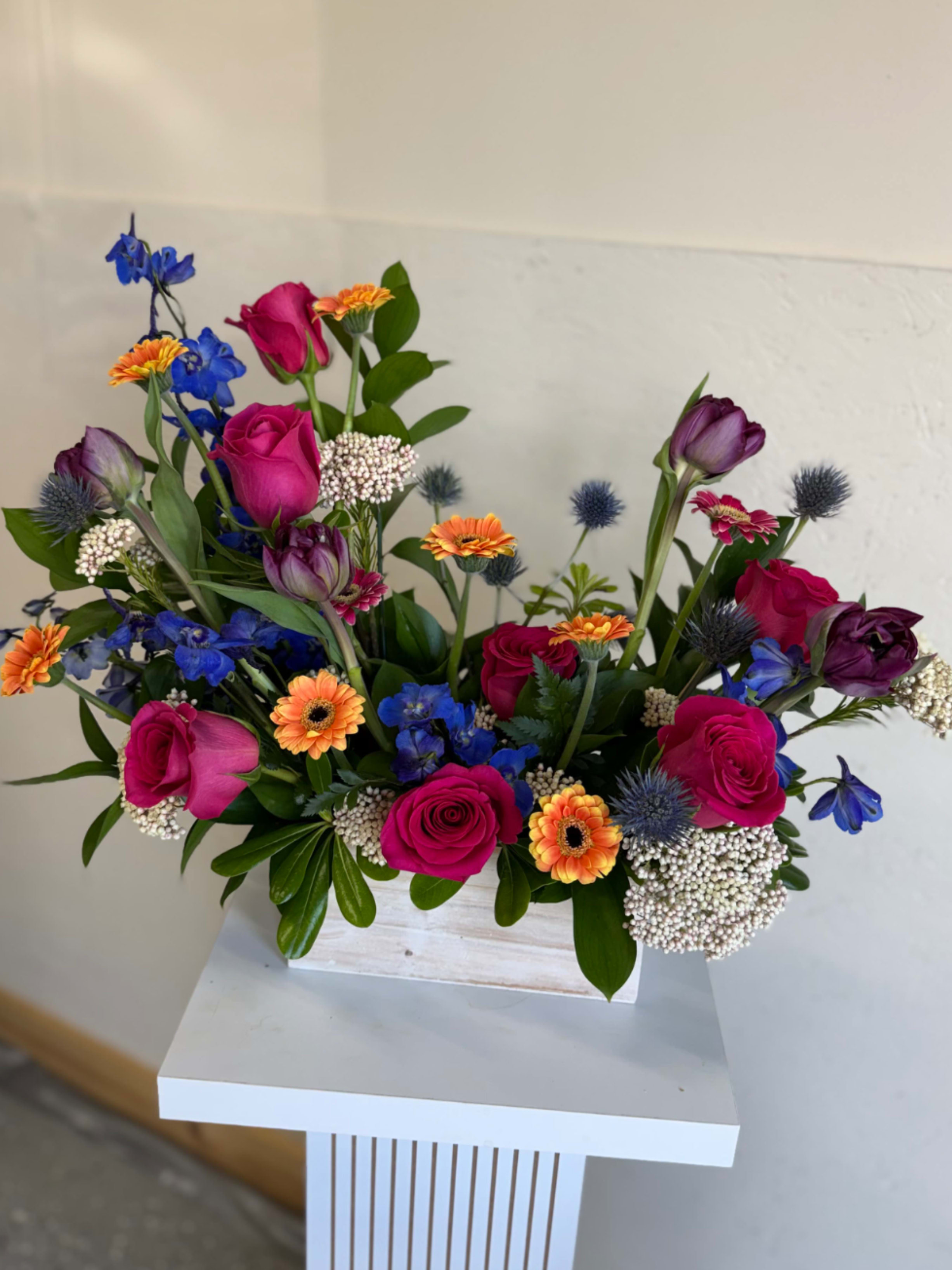 Forever Yours - A romantic blend of red roses and white lilies and sunflowers for timeless devotion.