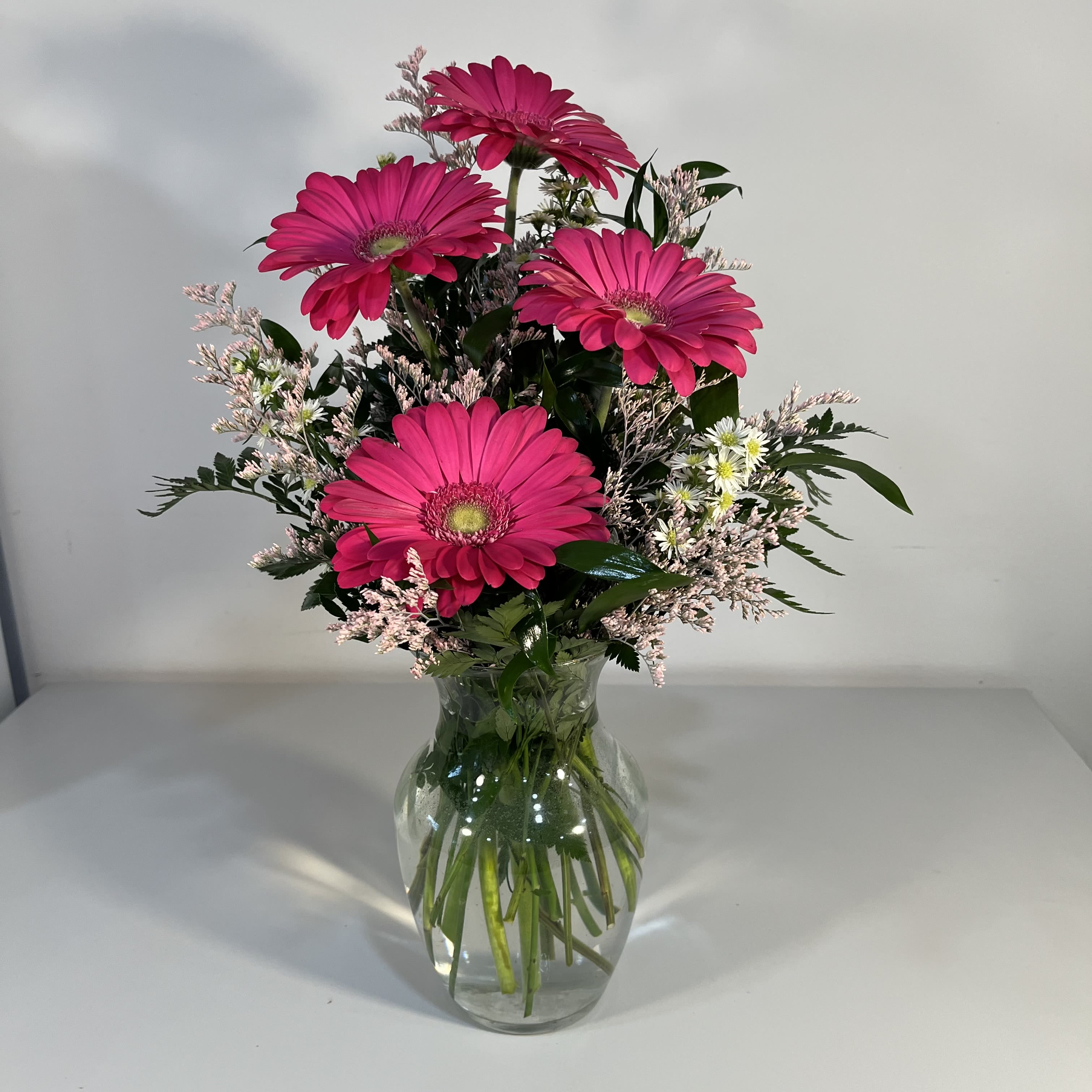 Gerbera Delight - Glass vase of Gerbera Daisy and fillers