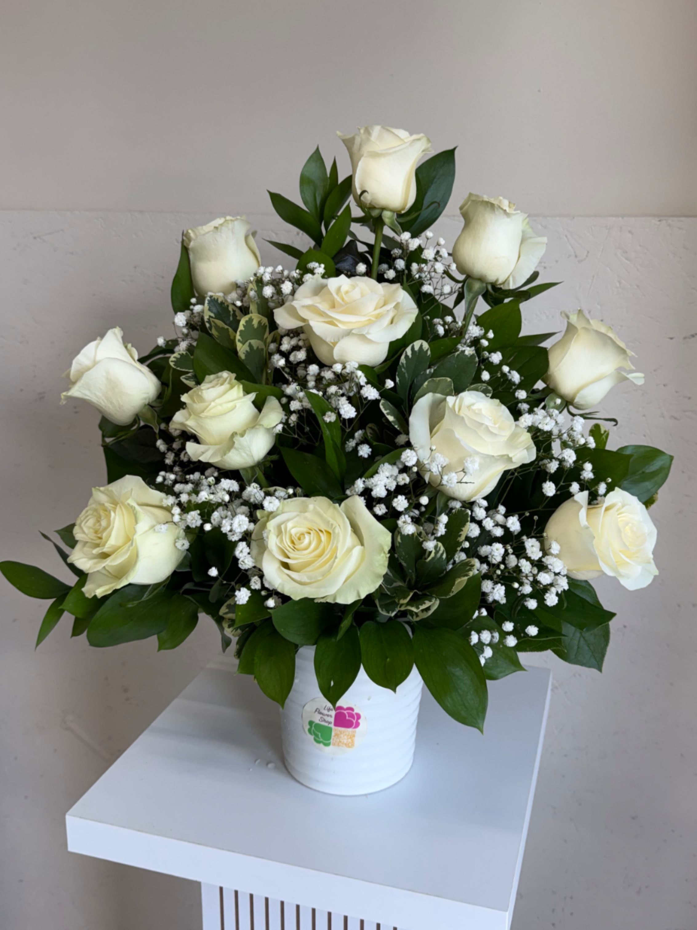 Serenity Blooms Arrangement - Soft beige and blush tones, offering comfort and gentle support during difficult times