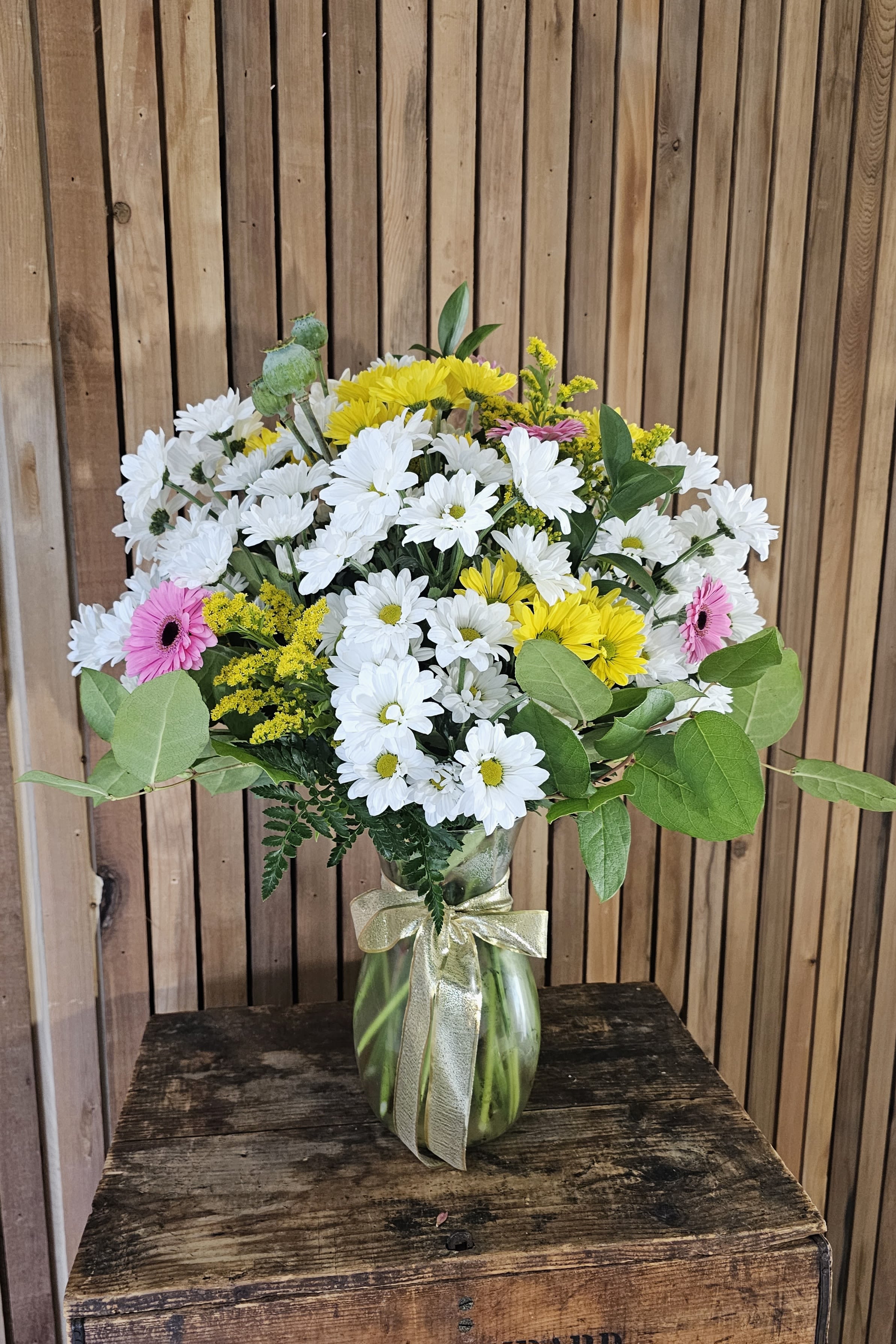Daisy's for Dayz - “Daisy's for Dayz” is a joyful arrangement made entirely of fresh daisies, gathered in a full, lush display. Simple, bright, and effortlessly charming, it brings a sense of happiness that lasts for days. 