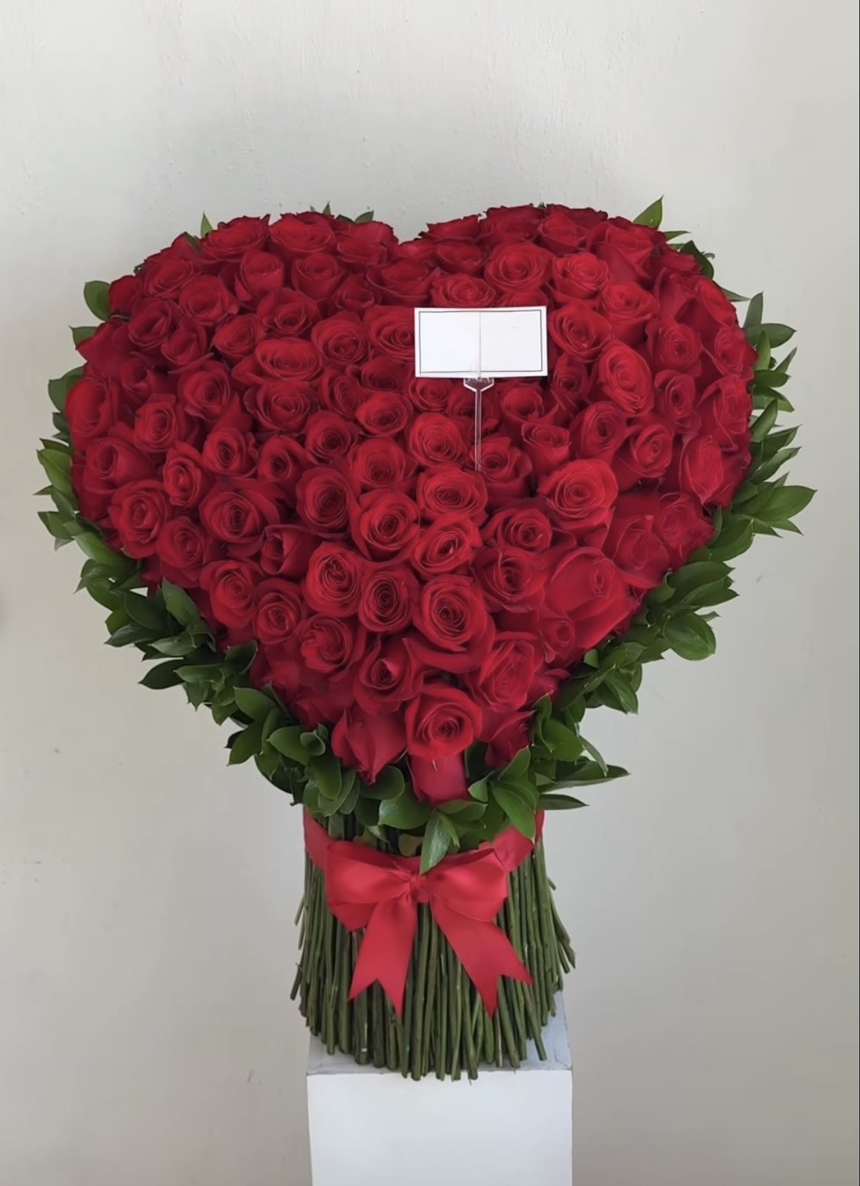 Hart Roses and any colors - Make hearts skip a beat ️  Say everything you feel—without saying a word. This stunning heart-shaped bouquet of premium red roses is the ultimate symbol of love, passion, and unforgettable moments.   Handcrafted to perfection  Dozens of fresh, velvety red roses  Elegant ribbon finish for a luxurious touch  Perfect for anniversaries, proposals, birthdays, or “just because.”  When ordinary isn’t enough—give a heart that lasts in memory forever.  Order now. Make it unforgettable.