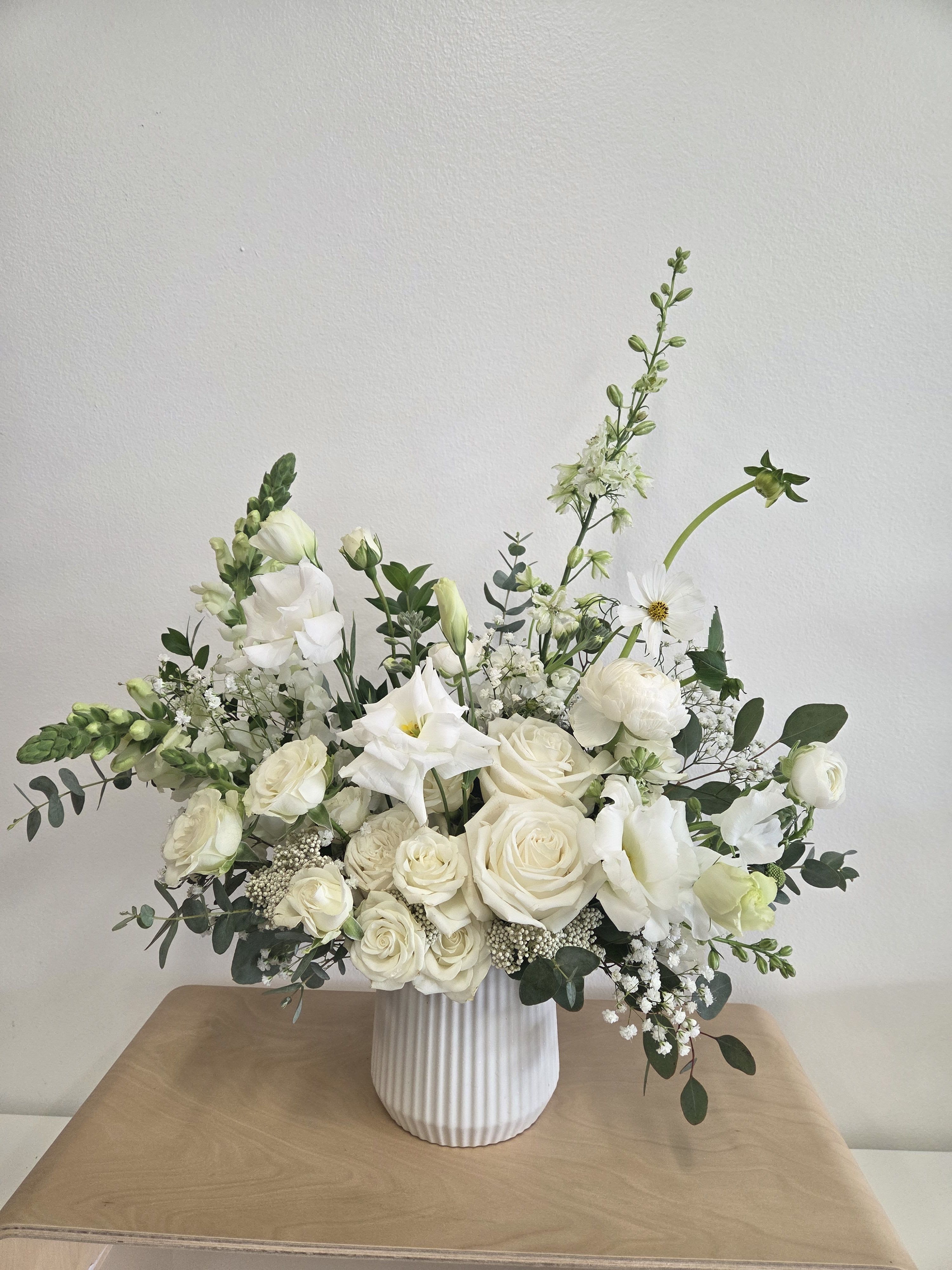 White Whistler (New!) - Store Hours Mon–Fri: 9:30 a.m. – 6:00 p.m. Sat: 9:00 a.m. – 4:00 p.m. Sun: Closed  Delivery Deliveries are typically made between 9:00 a.m. and 3:00 p.m. While we are unable to guarantee specific delivery times, we will always do our best to accommodate your requests. If you prefer a later afternoon delivery, please let us know in advance and we will try to accommodate. If your delivery address requires a gate code, please provide it to ensure smooth delivery.  Pick-Up If you need to pick up before 10:00 a.m., please text us directly to place your order. (Text: 714-715-1482) For pick-ups at opening time, we kindly ask that orders be placed by 4:00 p.m. the day before. Please also try to pick up your order at the scheduled time. When pick-ups are delayed during busy time slots, it may affect other customers placing orders for the same time. We appreciate your understanding!  Custom &amp; Event Orders For 1st B-Day Party or Baby Shower flower orders, please text us first with your preferred date, size, quantity, and detailed color/ design requests before placing an order.  For small event or custom flower orders requiring pick-up outside of our regular business hours, please contact us via text in advance to arrange your order.  Please Note Your arrangement may vary slightly from the photos depending on seasonal availability and store stock. However, we will match the overall color palette and ensure your flowers are fresh and beautifully designed.  Thank you!!