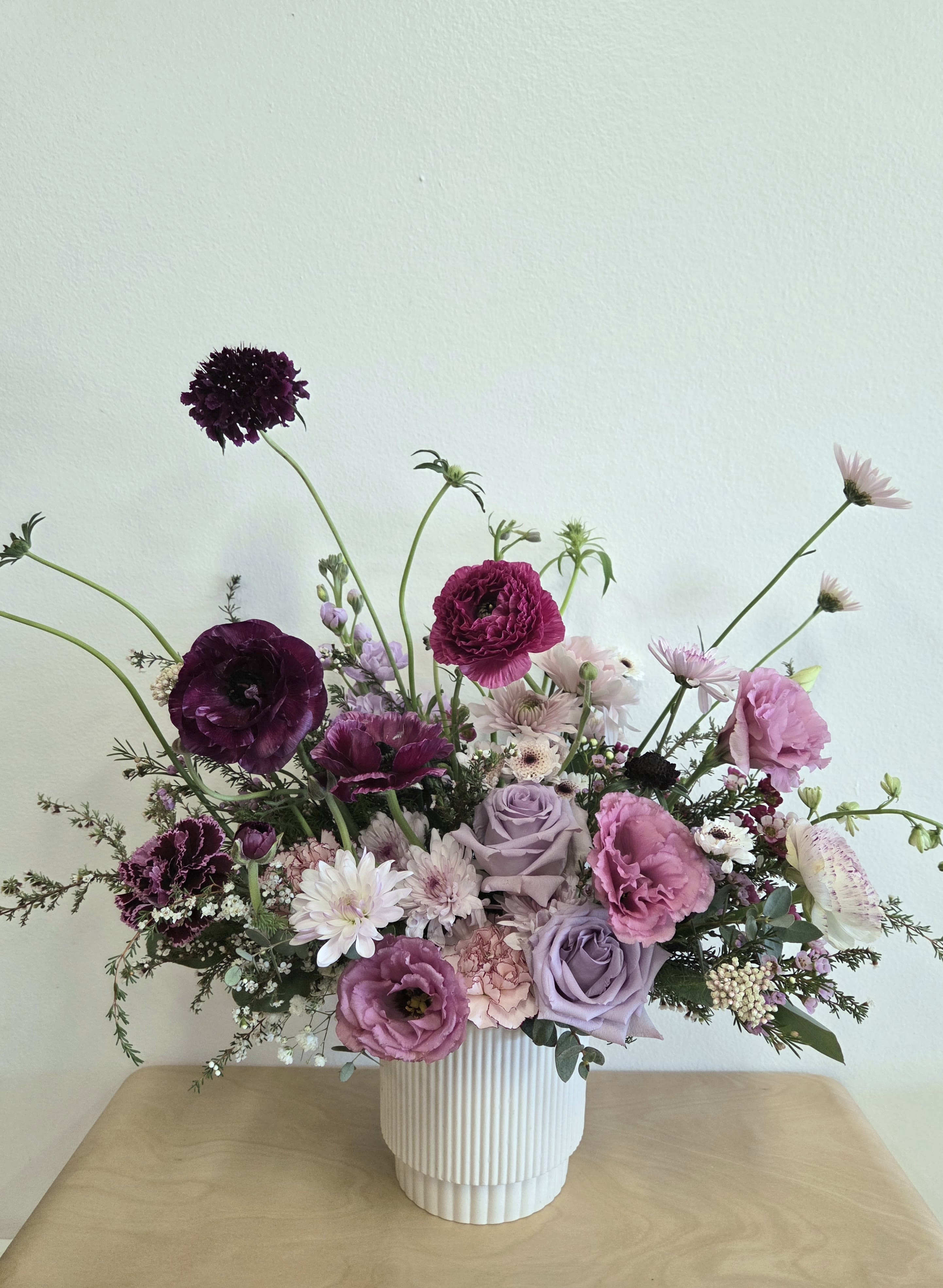 Moonlit Lavender Mist - Store Hours Mon–Fri: 9:30 a.m. – 6:00 p.m. Sat: 9:00 a.m. – 4:00 p.m. Sun: Closed  Delivery Deliveries are typically made between 9:00 a.m. and 3:00 p.m. While we are unable to guarantee specific delivery times, we will always do our best to accommodate your requests. If you prefer a later afternoon delivery, please let us know in advance and we will try to accommodate. If your delivery address requires a gate code, please provide it to ensure smooth delivery.  Pick-Up If you need to pick up before 10:00 a.m., please text us directly to place your order. (Text: 714-715-1482) For pick-ups at opening time, we kindly ask that orders be placed by 4:00 p.m. the day before. Please also try to pick up your order at the scheduled time. When pick-ups are delayed during busy time slots, it may affect other customers placing orders for the same time. We appreciate your understanding!  Custom &amp; Event Orders For 1st B-Day Party or Baby Shower flower orders, please text us first with your preferred date, size, quantity, and detailed color/ design requests before placing an order.  For small event or custom flower orders requiring pick-up outside of our regular business hours, please contact us via text in advance to arrange your order.  Please Note Your arrangement may vary slightly from the photos depending on seasonal availability and store stock. However, we will match the overall color palette and ensure your flowers are fresh and beautifully designed.  Thank you!!