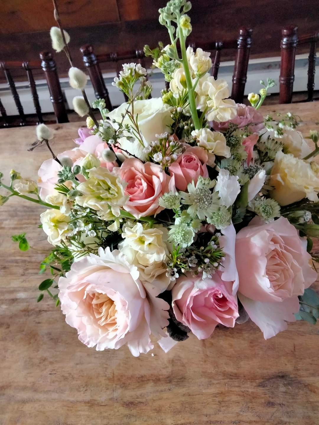 Lyceum Bouquet - This is a design I came up with for a bridal shower at the Herb Lyceum in Groton. It uses all the most premium david Austin Roses in a variety of colors with fragrant stock, double lisianthus, and whimsical greens. 