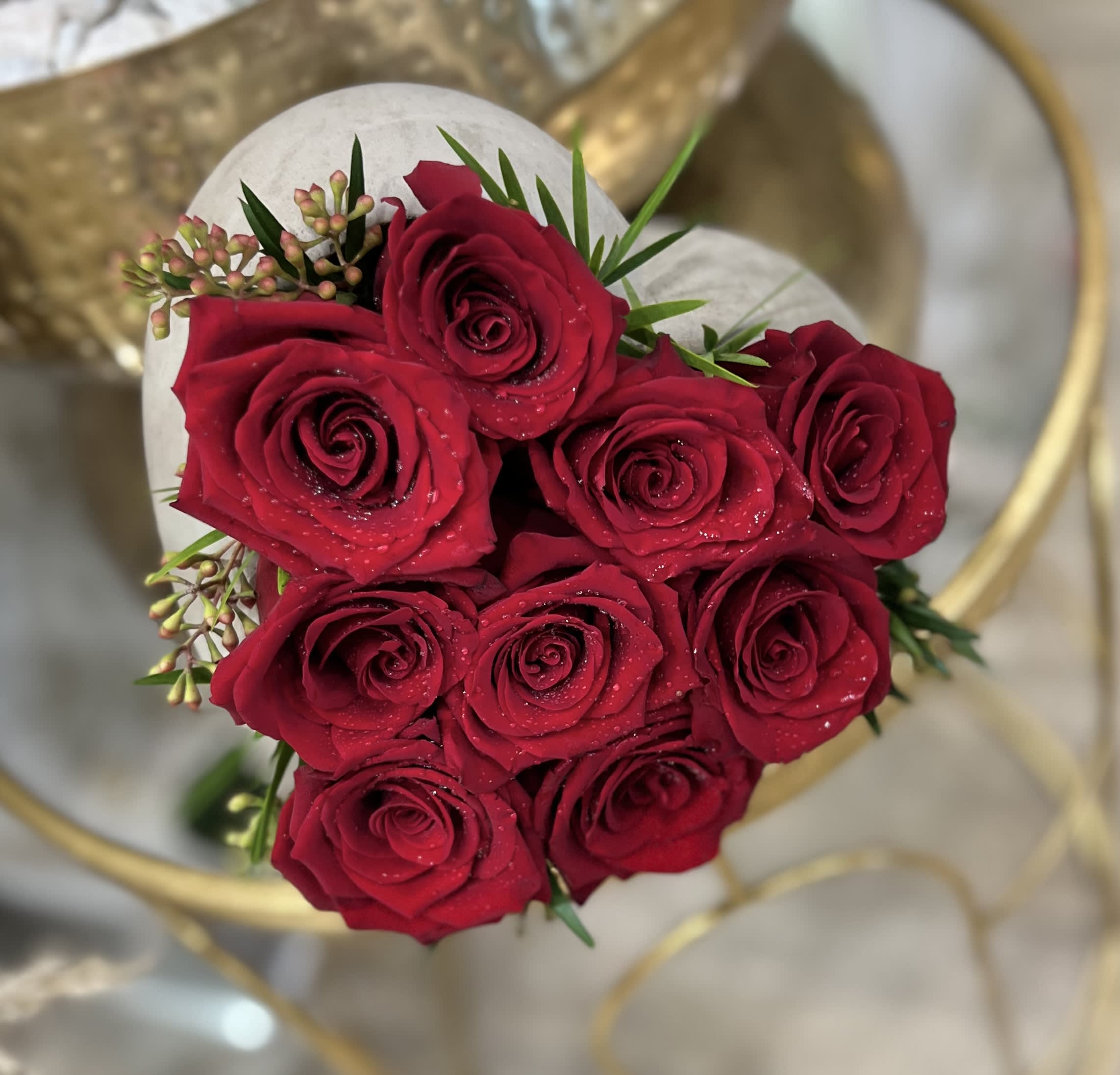 Bouquet of red roses with small filler flowers