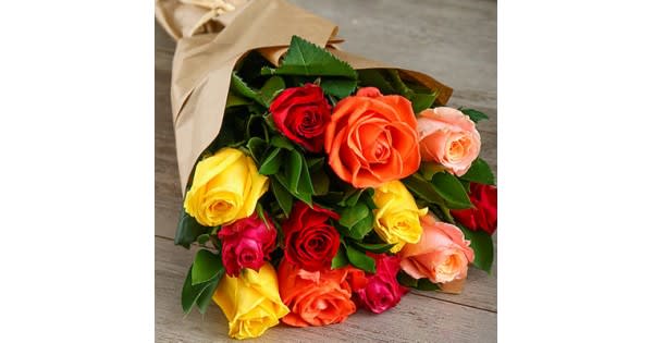 One Dozen Valentine's Day Roses - The Mixed Valentine's Dozen: a classic yet sophisticated palette of rose colors. Artfully blended for those who prefer their affection expressed in vibrant, living color.