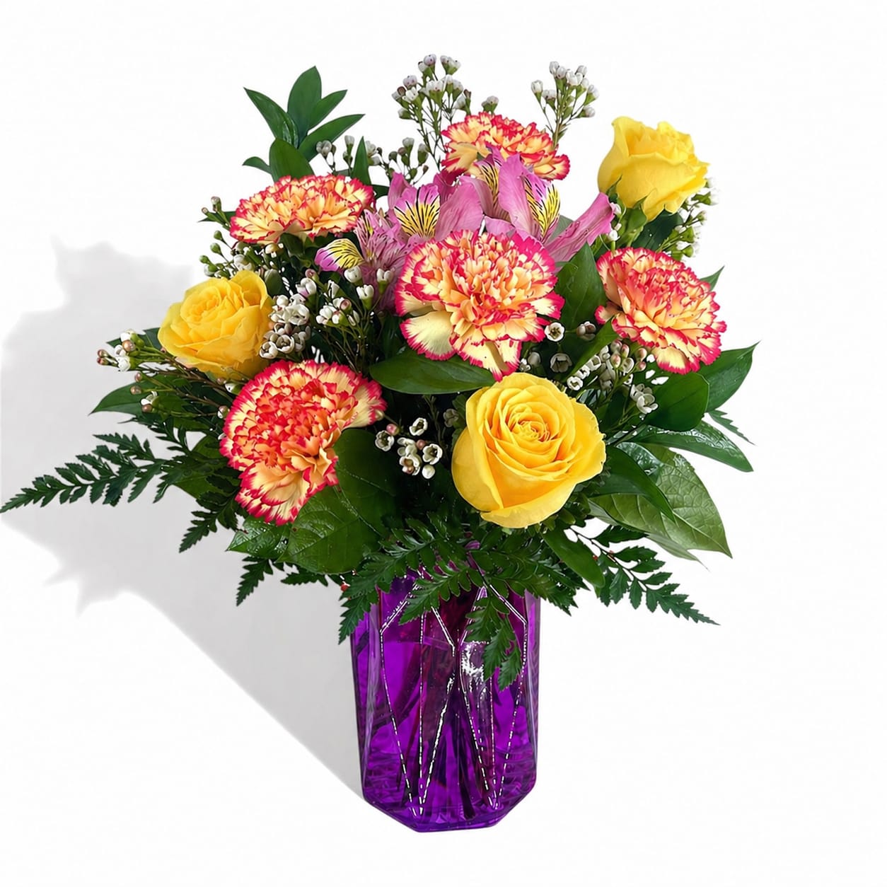 Moms Radian Smile - Designers Choice  - Moms Radiant Smile is a vibrant and cheerful flower arrangement created especially for Mother's Day. This designer's choice bouquet features a bright composition of roses, alstroemeria, and carnations in a beautiful color palette chosen by our skilled florists. The combination of these blossoms will surely bring joy and warmth to your mom's special day, reflecting the radiance of her smile. Surprise and delight your mom with this stunning floral creation that captures the essence of her beauty and love. Let Moms Radiant Smile be a symbol of appreciation and admiration for the extraordinary woman in your life.