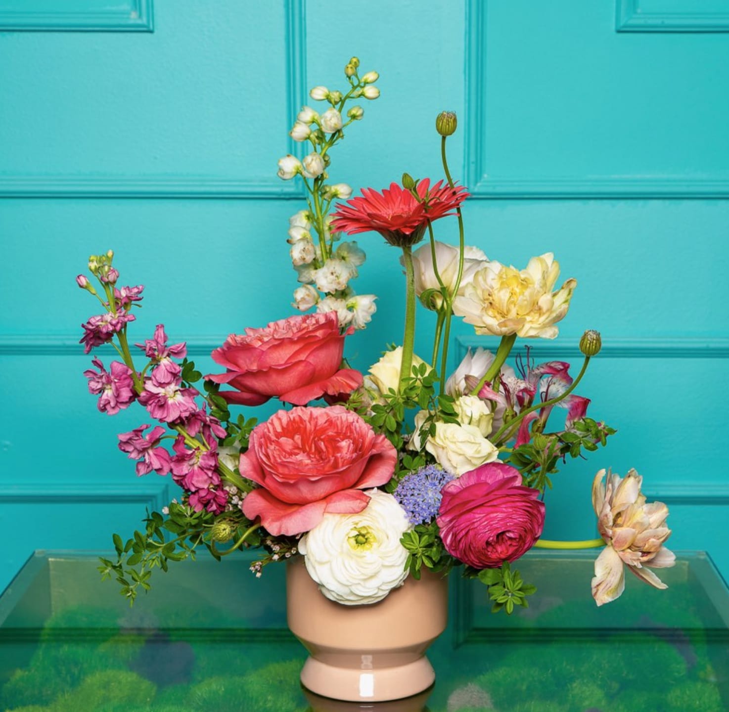 The Legacy of Tracy - The Mrs. Tracy Collection: A Mother in Full Bloom is a love letter to the woman who holds it all together gracefully, powerfully, and with style. Inspired by a cheer coach, devoted wife, and mother/ grandmother, each arrangement embodies a different facet of her: her discipline, warmth, playfulness, resilience, and elegance.  These florals are lush, joyful, and full of movement, just like the life Mrs. Tracy nurtured.   Designed in The Flower Pot BK’s signature aesthetic, this collection blends vibrant blooms with delicate textures, creating arrangements that feel both celebratory and deeply personal.  This is for the mothers who lead, love loudly, and make beauty out of everything they touch.  *Arrangements come as designed in the vase or box if pictured, wrapped in our signature paper if no vase is shown. 