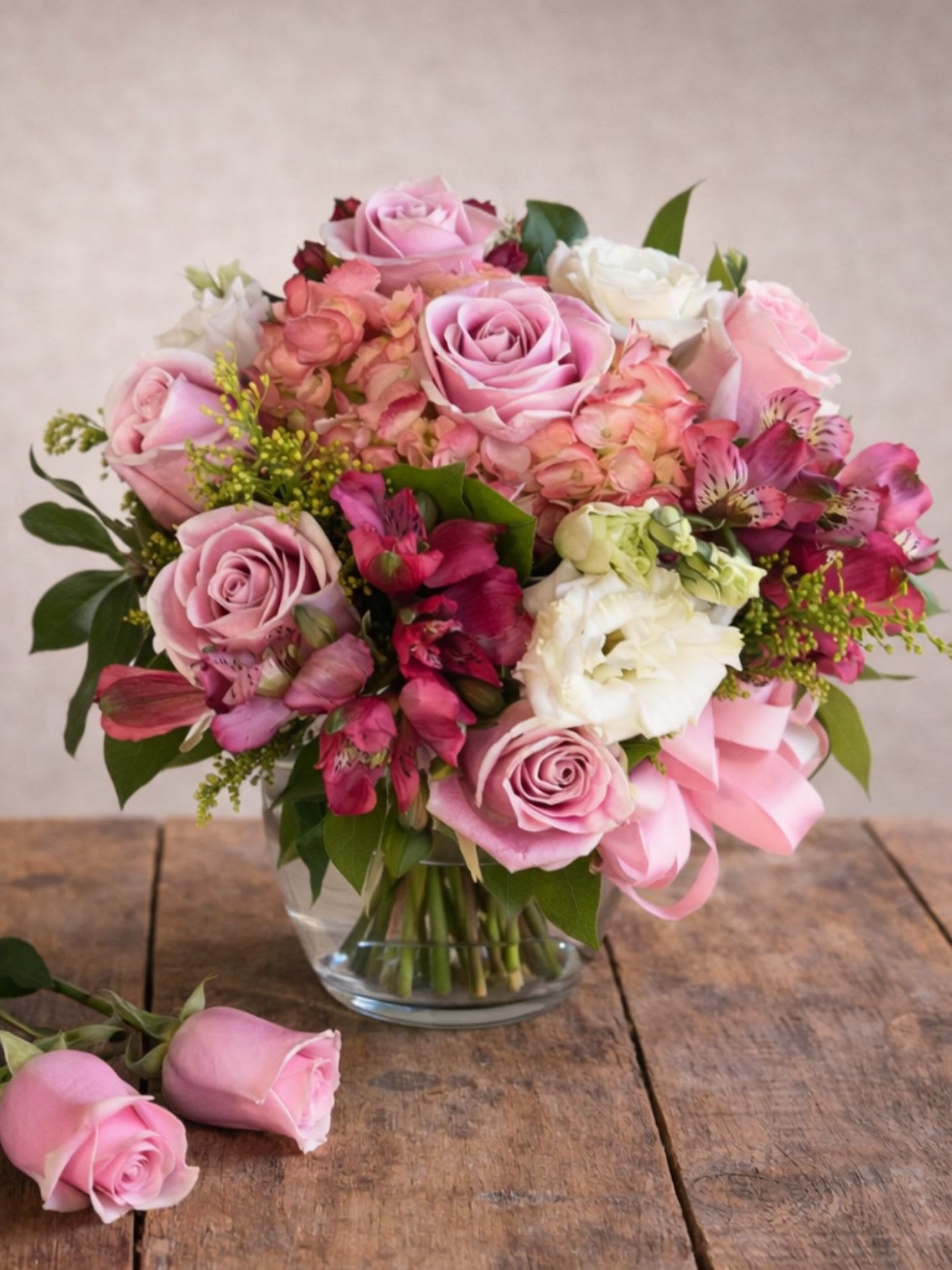 Phyllis – Romantic Pink &amp; White Floral Arrangement - Looking for a romantic flower arrangement in Round Rock, TX? The Phyllis arrangement by Floral Fabulous features soft pink and white flowers with same-day delivery available. Perfect for anniversaries, birthdays, or heartfelt moments, this elegant design is handcrafted by your trusted local florist on Mays Street in Round Rock. The Phyllis Romantic Floral Arrangement is a timeless expression of elegance and softness, featuring a beautiful blend of fresh pink and white flowers arranged in a classic glass vase. Designed with premium blooms, lush greenery, and delicate accents, this arrangement creates a full, airy look that feels both romantic and refined.  Ideal for anniversaries, birthdays, sympathy, or just because, this design brings warmth and beauty to any space.  At Floral Fabulous in Round Rock, TX, every arrangement is hand-crafted with attention to detail and freshness, ensuring a high-end presentation that stands out. We proudly offer same-day flower delivery in Round Rock and surrounding areas, making it easy to send a meaningful gift exactly when it matters most.   Premium pink and white flowers  Soft, romantic garden-style design  Arranged in a clear glass vase  Perfect for multiple occasions  Same-day delivery available in Round Rock, TX