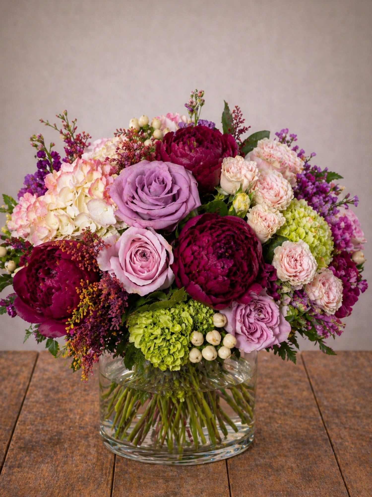 Velvet Peony Garden – Roses &amp; Hydrangea Arrangement - Looking for a peony and rose arrangement in Round Rock, TX? Velvet Peony Garden by Floral Fabulous features lush peonies, premium roses, and hydrangea with same-day flower delivery available.  Peony Garden – Roses &amp; Hydrangea Arrangement is a lush, garden-inspired floral design featuring a beautiful blend of premium peonies, roses, hydrangea, and seasonal accent flowers, artfully arranged in a clear glass vase with soft greenery and delicate textures. The combination of full, romantic blooms and rich tones creates an elegant display that feels both timeless and luxurious. This arrangement is especially perfect for Mother’s Day, offering a thoughtful and elevated way to celebrate with one of the most requested flowers—peonies—paired with classic roses and soft hydrangea.  At Floral Fabulous in Round Rock, TX, each design is hand-crafted using fresh, high-quality flowers and attention to detail, ensuring a polished, high-end presentation every time.  We proudly offer same-day flower delivery in Round Rock, Pflugerville, Hutto, Georgetown, and surrounding Austin areas, making it easy to send a meaningful gift when it matters most.   Peonies, roses, and hydrangea  Soft, romantic, garden-style design  Designed in a clear glass vase  Perfect for Mother’s Day and special occasions  Same-day delivery available in Round Rock, TX