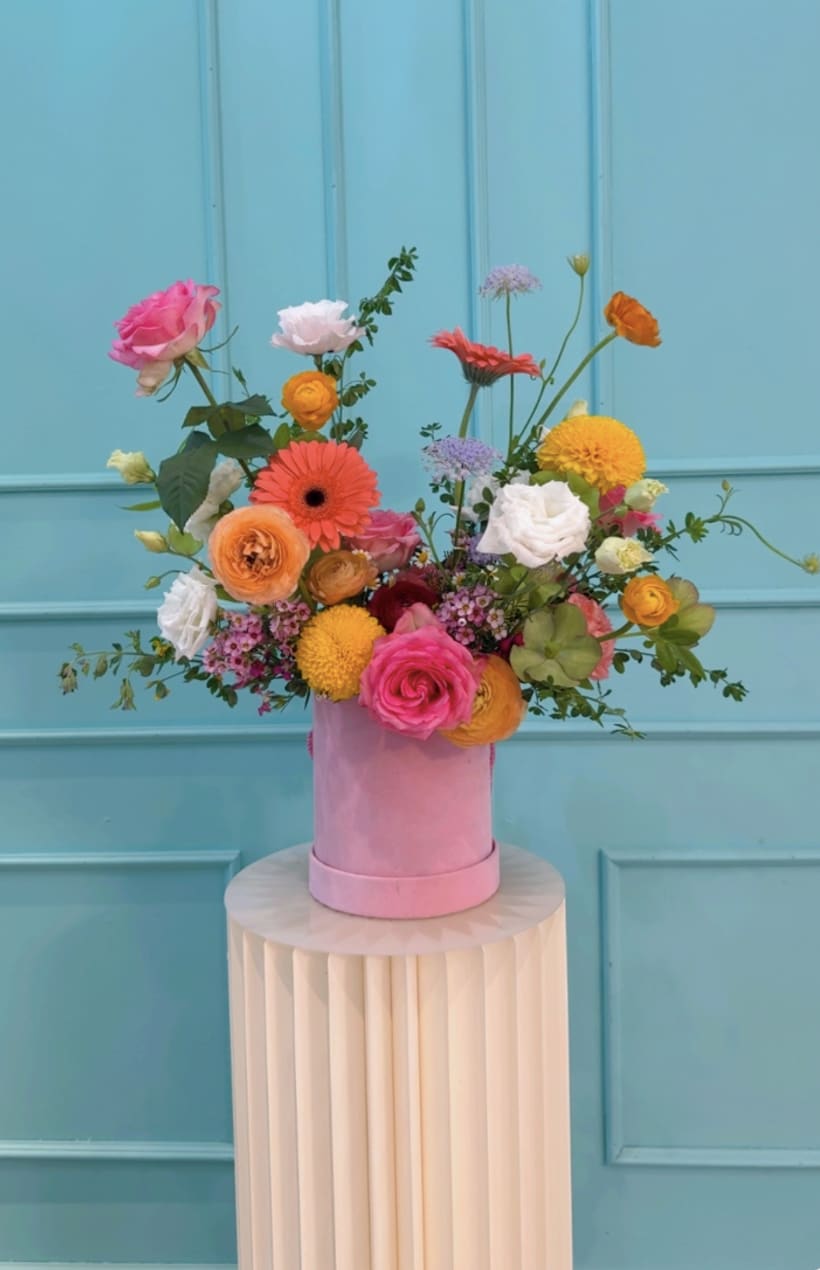 The Soft Wife Tracy  - The Mrs. Tracy Collection: A Mother in Full Bloom is a love letter to the woman who holds it all together gracefully, powerfully, and with style. Inspired by a cheer coach, devoted wife, and mother/ grandmother, each arrangement embodies a different facet of her: her discipline, warmth, playfulness, resilience, and elegance.  These florals are lush, joyful, and full of movement, just like the life Mrs. Tracy nurtured.   Designed in The Flower Pot BK’s signature aesthetic, this collection blends vibrant blooms with delicate textures, creating arrangements that feel both celebratory and deeply personal.  This is for the mothers who lead, love loudly, and make beauty out of everything they touch.  *Arrangements come as designed in the vase or box if pictured, wrapped in our signature paper if no vase is shown. 