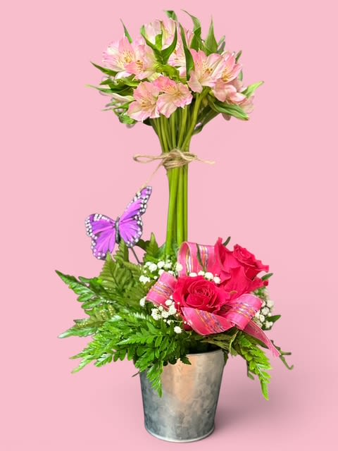 We'll see.   - A show stopper for sure filled with alstromaria, roses, and butterflies