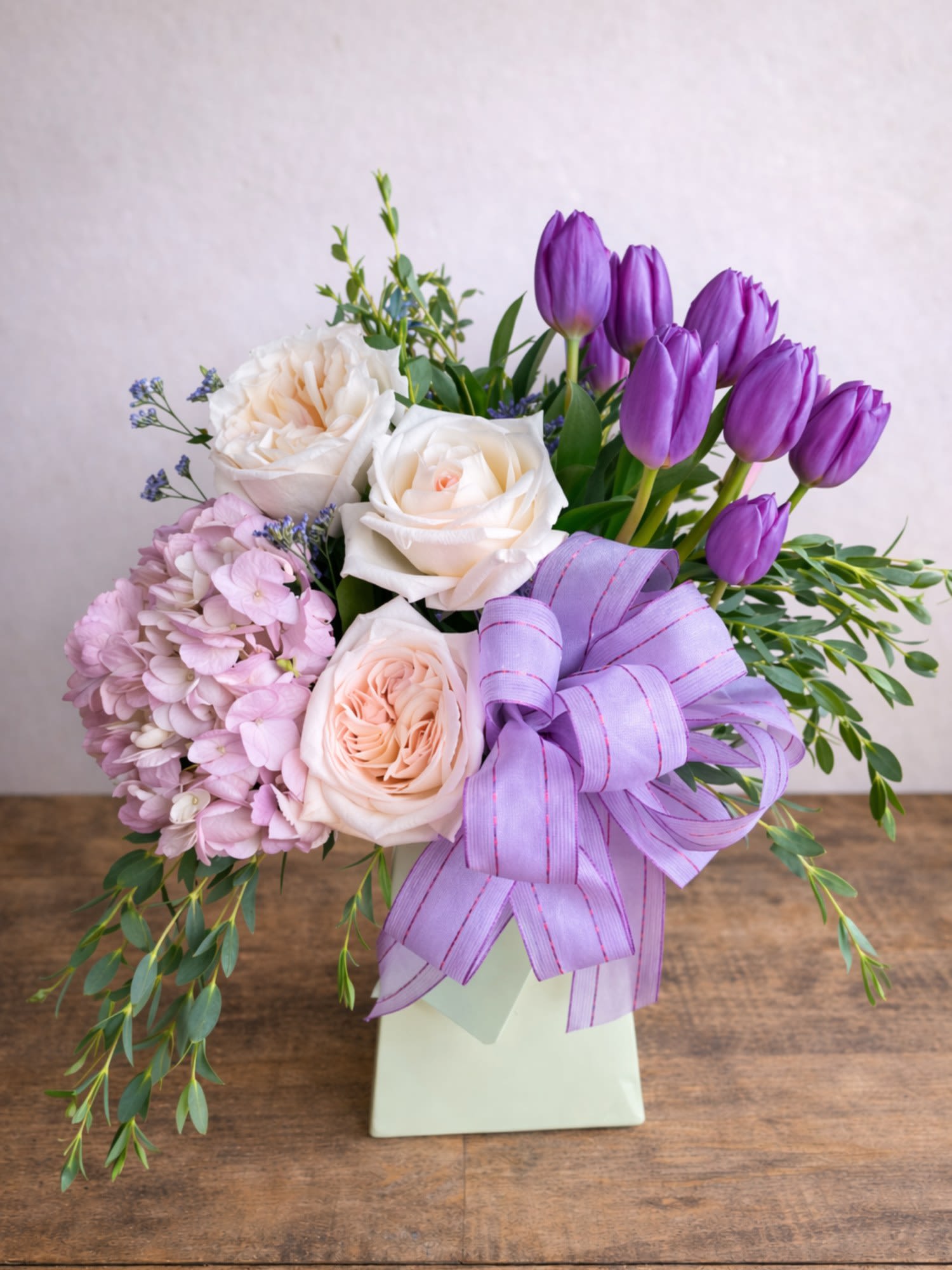 Tender Tulips - Tender Tulips is a soft and elegant floral arrangement featuring delicate light pink tulips, premium roses, and lush hydrangea, designed by Floral Fabulous in Round Rock, Texas. This romantic design blends soft pastel tones with fresh greenery for a timeless and graceful look.  Accented with complementary filler flowers and arranged in a modern vase, Tender Tulips is perfect for birthdays, anniversaries, sympathy, or simply brightening someone’s day. The light pink tulips bring a sense of warmth and charm, making this arrangement ideal for spring and everyday occasions.  Handcrafted by expert florists, each arrangement is designed with attention to detail and premium fresh flowers to ensure long-lasting beauty.  Available for local delivery and pickup in Round Rock, Pflugerville, Georgetown, and the greater Austin area.