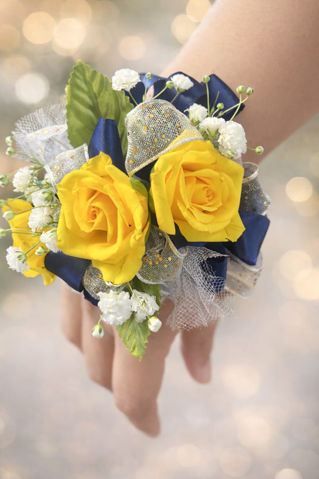 Yellow Corsage  - ribbon is navy blue 