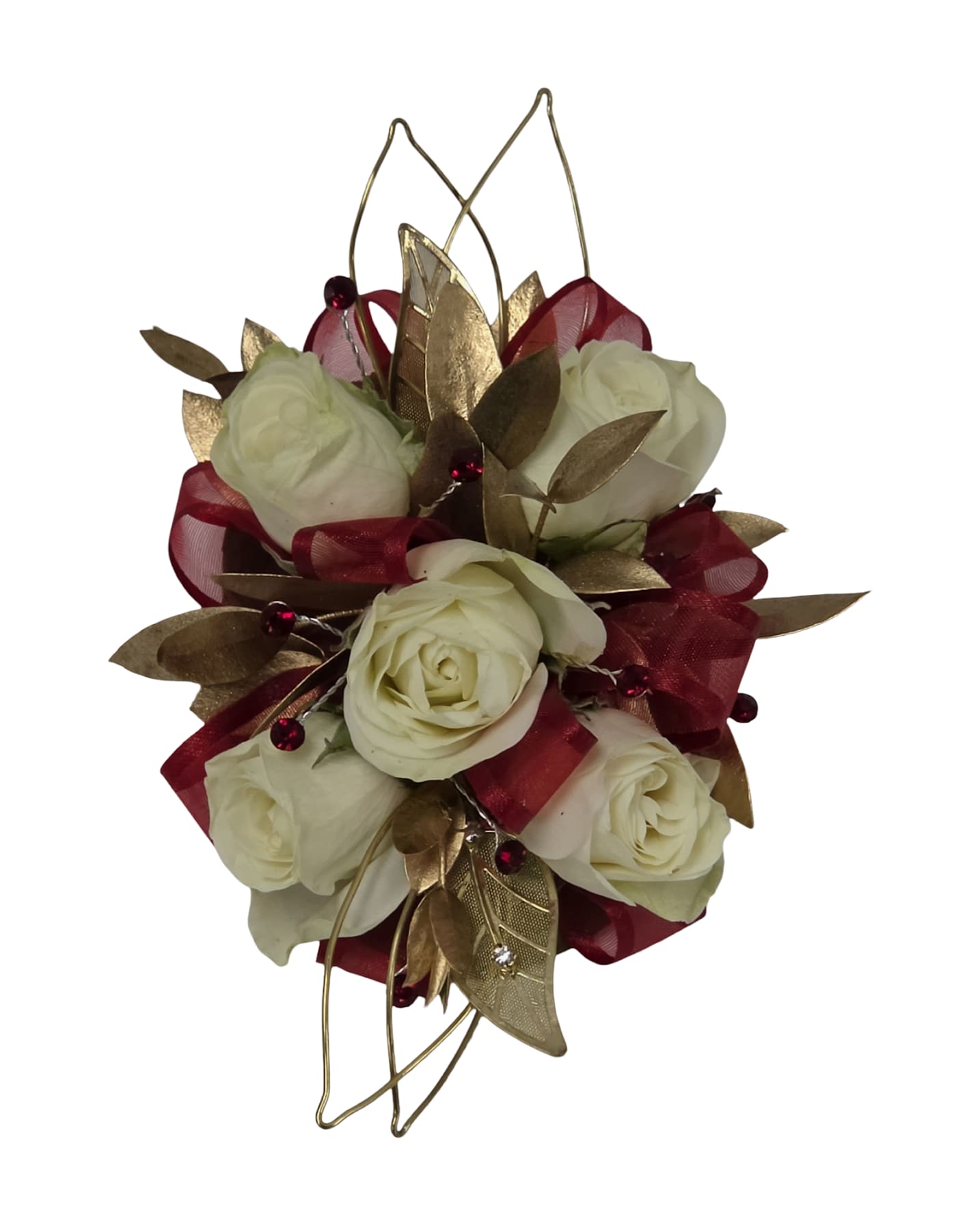 Golden Manor Wristlet - A compact wristlet arrangement that reads like wearable jewelry - white spray roses gathered into a tight, rounded wristlet with red ribbon loops and metallic gold leaf picks for a luxe, celebratory finish. Perfect for prom or a formal event, this wrist corsage sends a romantic, polished message the moment it's placed on the person you're thinking of.  The design pairs pure white spray roses with rich red accents, reflective gold leaves, and jewel-like decorative beads for texture and sparkle. Finished with decorative ribbon and secure fastening, the piece sits comfortably on the wrist as a hand-held, ornamental floral accent.