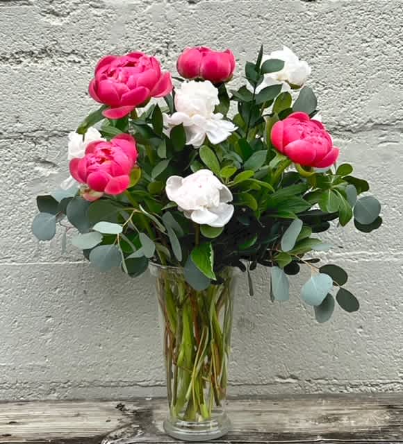 French Kiss - French Kiss =  What more do you need to say? An elegant vase, with peonies (colors may vary), with eucalyptus accents.   