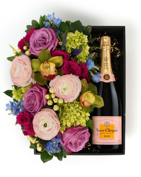 Flora Box Pastel Veuved Clicquot Rose - A pastel floral arrangement in a wood box paired with Veuve Clicquot Rose', a thoughtful gift to enjoy and share.