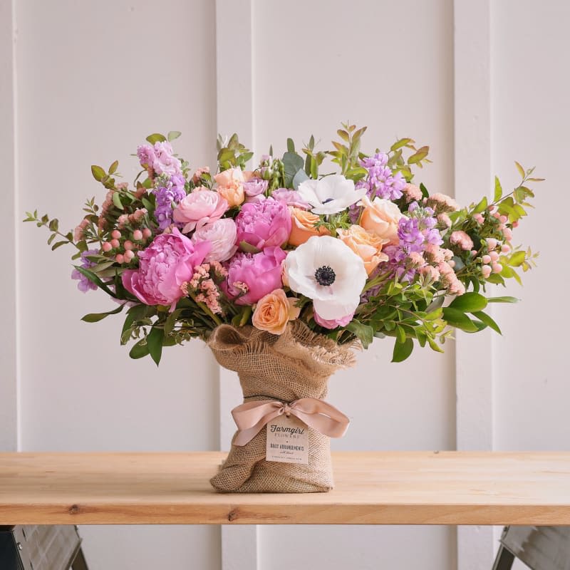 Gift Card  - Give the person you're thinking of the freedom to choose a bouquet they'll truly love with a digital gift card for floral arrangements, bouquets, and gifts. Perfect for birthdays, anniversaries, Mother's Day, Valentine's Day, or a heartfelt thank-you, this gift lets them browse our full selection and pick something that fits their style - from romantic peony and rose compositions to fresh seasonal designs with anemones and lavender accents.  They can use the card to order the kind of garden-inspired arrangements shown here: soft pink peonies and roses paired with peach blooms, white anemones, and lavender-hued stock, finished in rustic burlap wrap with a satin ribbon and a personalized gift tag. The recipient can choose size options, delivery date, and add-ons so the final bouquet feels made-to-order for their occasion.  Redeeming is simple and convenient - delivered digitally so they can shop right away and schedule delivery when it suits them. Give a thoughtful, flexible gift that lets them pick the exact arrangement that will make them feel celebrated and seen.